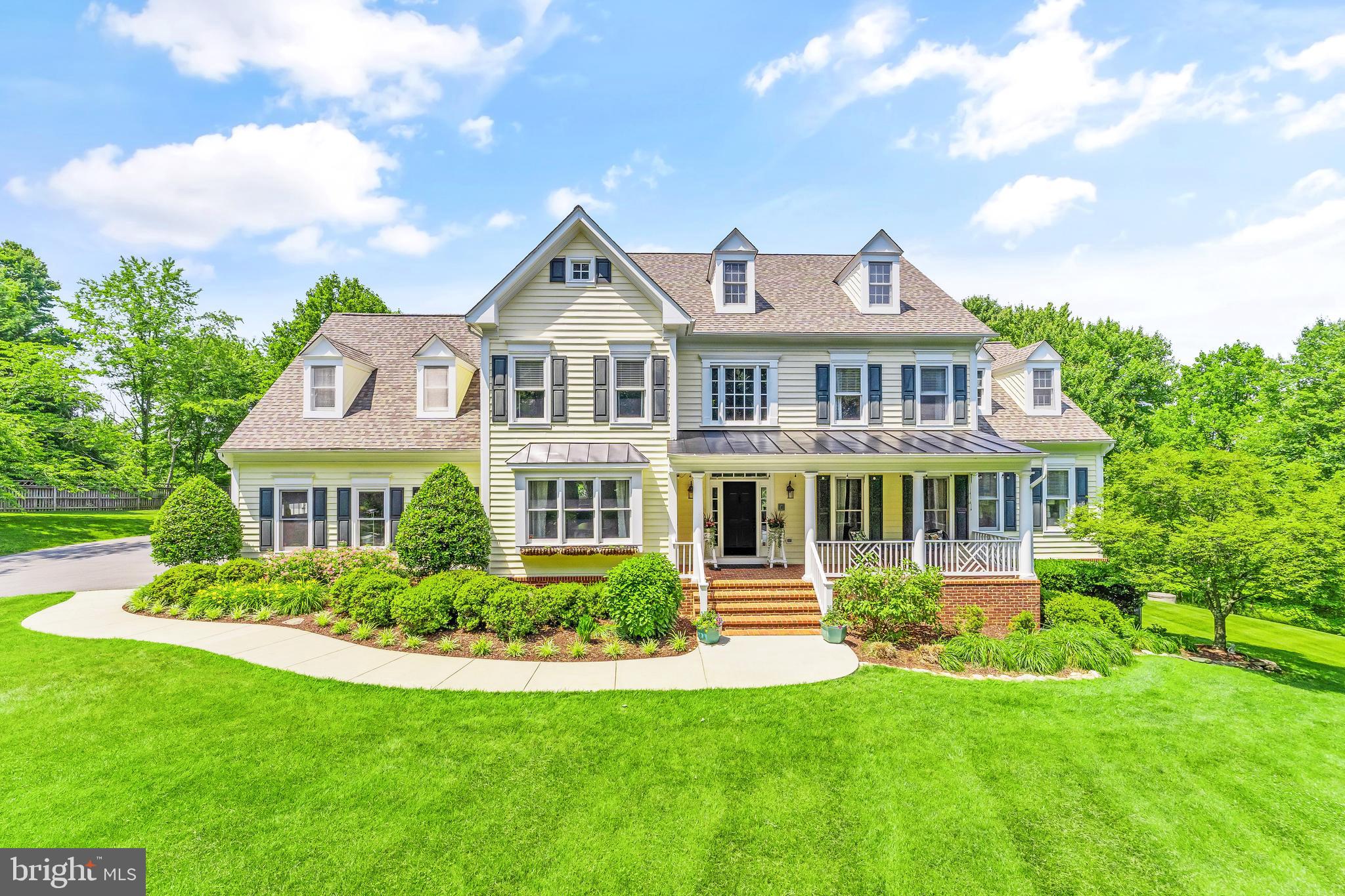 Welcome to your own private sanctuary nestled in the heart of Loudoun County, where luxury meets tranquility on 11 sprawling acres in Hamilton, VA. Nestled just minutes away from the vibrant downtown of Leesburg, this meticulously crafted property offers over 6300 square feet of finished living space, designed to elevate every aspect of your lifestyle.  The home has custom details throughout, designed and imagined by the owners, who are also owners of the Loudoun based design company, Two Poppies Design.  With their talent for transforming builder-grade elements into one-of-a-kind designs, this home looks and feels as if it was developed by a custom home builder.

The large covered porch is a quintessential feature of the home, providing a welcoming space that overlooks the front yard and the long driveway leading up to the residence.  As you step inside, the expansive floor plan unfolds before you, with an impressive two-story foyer. The main level delights with a chef's kitchen fit for culinary enthusiasts, complete with Jenn-Air appliances, a large center island with seating for four, and a breakfast room enveloped by panoramic picture windows, offering breathtaking views of the surrounding landscape.  Adjacent, the family room beckons with its inviting ambiance, anchored by a cozy gas fireplace, custom built-ins, and offering more picturesque views of the backyard. For ultimate convenience, a primary bedroom suite graces the main level, providing a serene retreat with a completely renovated dual-vanity bathroom and walk-in closet. Completing the main level are additional spaces for work and leisure, including an office, formal dining room, mudroom, laundry room, and a convenient half bathroom.

Upstairs, three generously sized bedrooms (plus flex room with closet and egress) await, including a second primary bedroom suite. The luxurious primary suite epitomizes indulgence, featuring dual vanities,  a soaking tub, separate shower, and an expansive walk-in closet.  The additional two bedrooms (plus flex room) on the upper level are complemented by en-suite or Jack-and-Jill bathrooms, providing privacy and comfort for family members or guests.

The lower level of the residence is dedicated to entertainment and leisure, boasting a vast walk-out finished basement with a game room,  additional flex room with closet and egress windows, full bathroom, and a media area, providing endless possibilities for recreation and relaxation. 

Outside, a composite deck spans the length of the back of the house, offering the perfect vantage point to admire the idyllic surroundings and acres of land awaiting exploration and enjoyment.  A highlight of the property is the custom-built 40' x 40' barn, constructed in 2018, offering ample space for storage, hobbies, or equestrian pursuits.

Additional features of this estate include high-speed internet connectivity (cost to install was over $11k), ensuring seamless connectivity for work or leisure activities.  Car enthusiasts and hobbyists will appreciate the inclusion of four garage spaces, with two attached and two detached, featuring an unfinished second level above the detached garage. This space is equipped with its own power supply and air filtration system, creating the perfect workshop or studio for creative endeavors.

With the recent installation of a new septic field in July 2022, a new roof with LandMark Pro shingles in 2021, two new water heaters in 2023, and three new HVAC units installed in 2016/2017, peace of mind and comfort are assured for years to come.

Beyond the residence, the property offers enchanting outdoor amenities, including a playhouse, treehouse, and ample space for outdoor recreation and relaxation.

Don't miss your chance to make this exquisite property your own retreat in the heart of Loudoun County. Schedule your private showing today and embark on a journey to discover your own piece of paradise in Loudoun County.