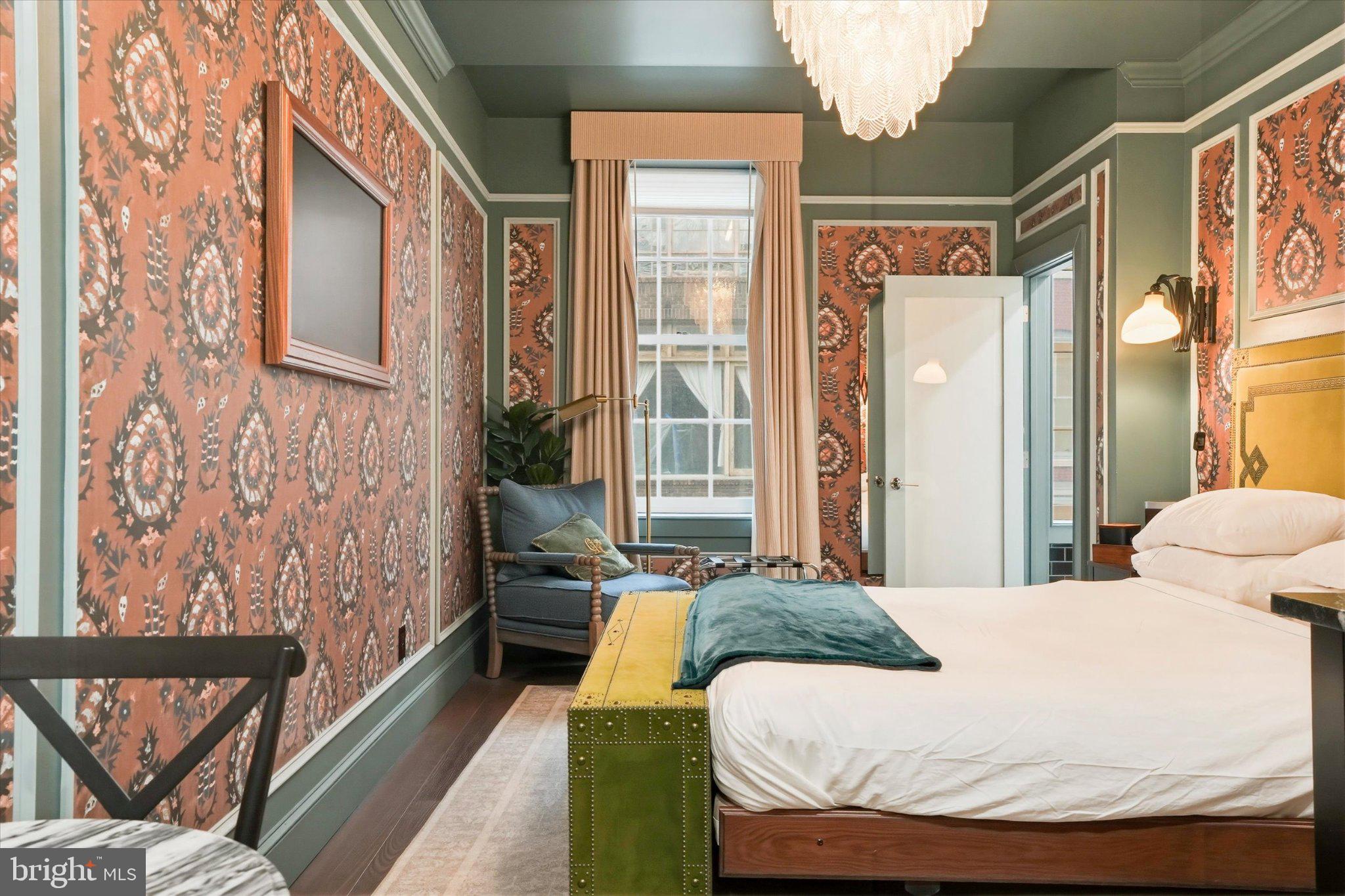 SDGRE is pleased to present The Gas Lamp Hotel, a fully operational 5-key boutique hotel located in the heart of Philadelphia's Old City Historic District. Built in 1899 and meticulously renovated in 2024, the property combines irreplaceable historic character with modern hospitality infrastructure across approximately 3,500 SF of mixed-use space at 140 N 2nd Street.

The asset is anchored by five individually designed guest suites. Adams, Davy, Edison, Latimer, and Tesla. The Edison Suite is a 3-bedroom premium configuration with a full kitchen, functionally equivalent to three rentable keys. The hotel is supplemented by an income-producing ground-floor art gallery, a private outdoor courtyard, and a fully built-out basement speakeasy currently activated as private event space.

Investment highlights
Fully operational 5-key boutique with a reservation system, OTA channels, a direct-booking website, and stabilizing month-over-month performance.
3-bedroom suite with full kitchen generates $391 ADR and $42,261 in 2025 room revenue — effectively three rentable keys within one physical suite, contributing meaningful incremental value beyond the physical room count.
The 1899 historic building was substantially renovated in 2024. Hotel opened August 2024 — buyer inherits modern systems, finishes, and FF&E with no near-term capital plan required.
Hotel rooms, ground-floor gallery lease, First Friday recurring events, and 5 confirmed private events for 2026 — diversifying cash flow with high-margin pass-through revenue.
+44% YoY revenue growth (Aug–Dec 2024 vs. 2025). +55% YoY direct-booking growth (Jan–Feb 2025 vs. 2026). Direct channel share now 58% of 2026 YTD revenue.
Steps from Independence Mall, the Delaware River waterfront, Race Street Pier, and Market Street's restaurant corridor — Philadelphia's #1 leisure tourism submarket.
Current 8% third-party management fee ( $19K/yr) represents  65 bps of stabilized cap rate expansion for an owner-operator buyer who self-manages the asset.
Listing Contacts