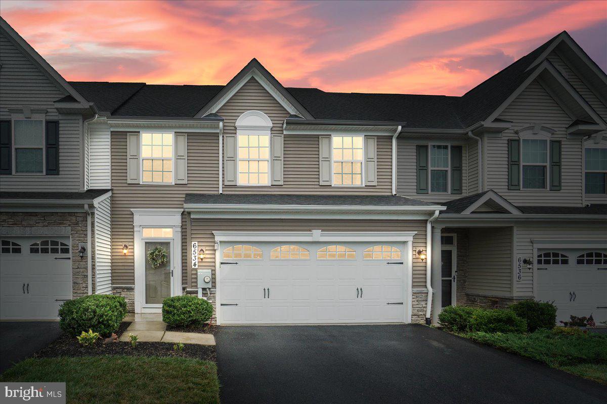 Welcome to this stunning 3-bedroom, 2.5-bath villa, perfectly located in the sought-after Ballenger Run neighborhood. Built just 6 years ago and meticulously maintained, this home features a main-level primary suite for added convenience. The open and airy main living room, with its floor-to-ceiling windows, is overlooked by the second living room on the upper floor, providing ample space for relaxation and entertainment. Elegant arched doorways throughout the home enhance its charm, while the fenced-in backyard and back patio offer a private outdoor retreat. With a 2-car garage and a fabulous location, this villa combines modern comfort with timeless appeal.