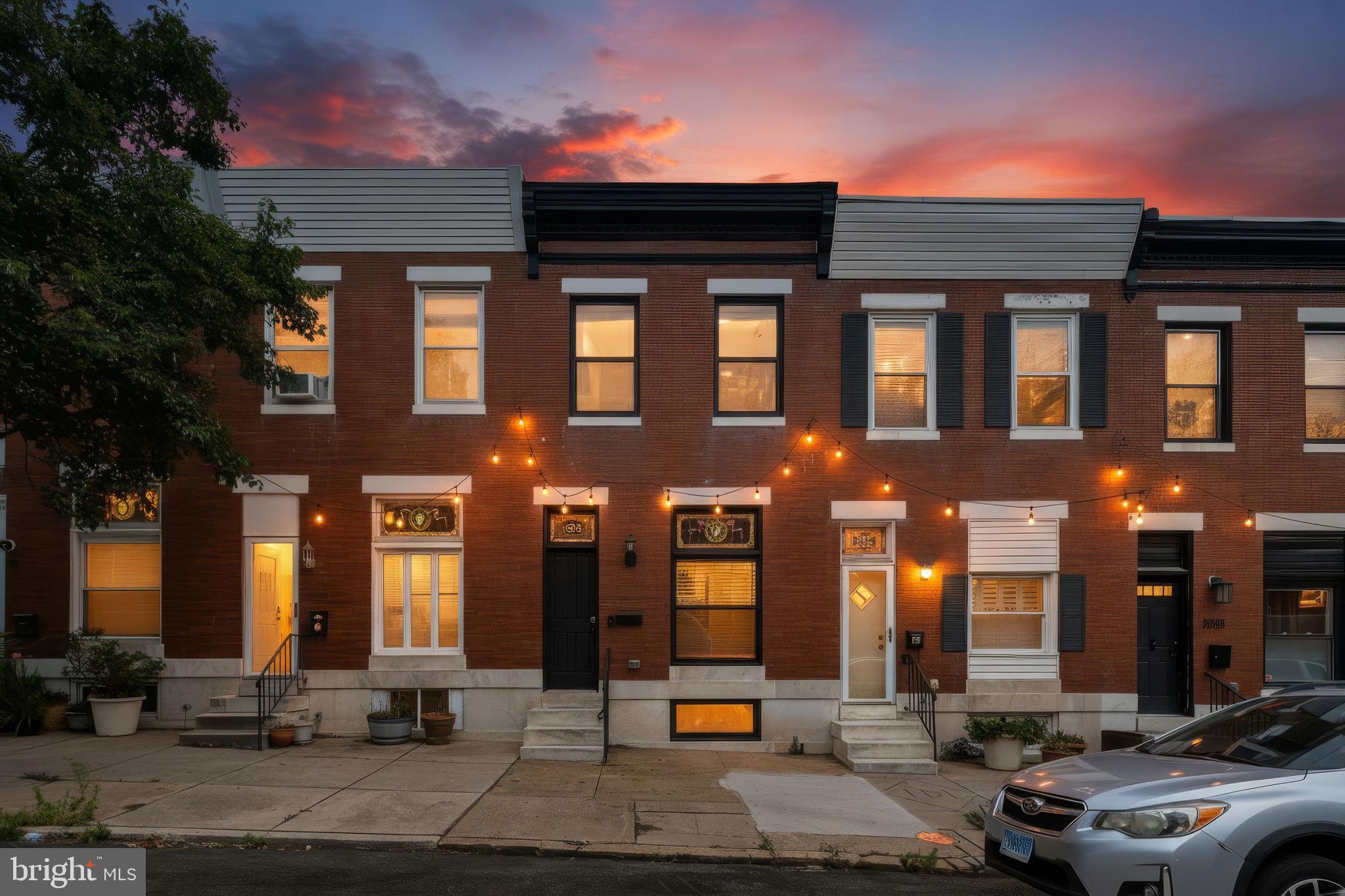 CHAP TAX CREDIT - 4 YEARS LEFT!!! Welcome to 3814 Hudson Street, a beautifully updated 3-bedroom, 3.5-bath, 14-foot-wide brick rowhome in the heart of sought-after Brewers Hill. Blending timeless Baltimore charm with modern finishes, this home features original stained glass, exposed brick accents, and rich hardwood flooring.

Step inside to a bright, open-concept main level designed for both everyday living and entertaining. The spacious living and dining areas boast high ceilings, beautiful crown molding, and timeless details. Equipped with a built-in sound system throughout the living area, this space has an elevated feel and an entertainment atmosphere that flows seamlessly into the well-appointed kitchen. The kitchen is equipped with abundant cabinetry, stainless steel appliances, a wall oven, tile backsplash, wine storage, and direct access to the rear patio. A convenient half bath completes the main level.

Upstairs, the impressive primary suite offers hardwood floors, abundant natural light, exposed brick accents, and a luxurious ensuite bath featuring a large walk-in shower and double vanity. The second bedroom features hardwood flooring and a walk-in closet and is served by a full hall bath. Step outside from the primary suite onto the newly stained private deck, where stairs lead to the expansive rooftop deck showcasing incredible panoramic city views.

The finished lower level provides exceptional flexibility with carpeting, recessed lighting, a spacious family room, a third bedroom, a full bath with a walk-in shower - perfect for guests, a home office, or additional living space.

Located just minutes from Canton Waterfront Park, Patterson Park, Brewers Hill shopping and dining, Johns Hopkins Bayview Medical Center, I-95, and Baltimore's Inner Harbor, this move-in-ready home offers the perfect combination of comfort, style, and convenience. Schedule your private showing today!