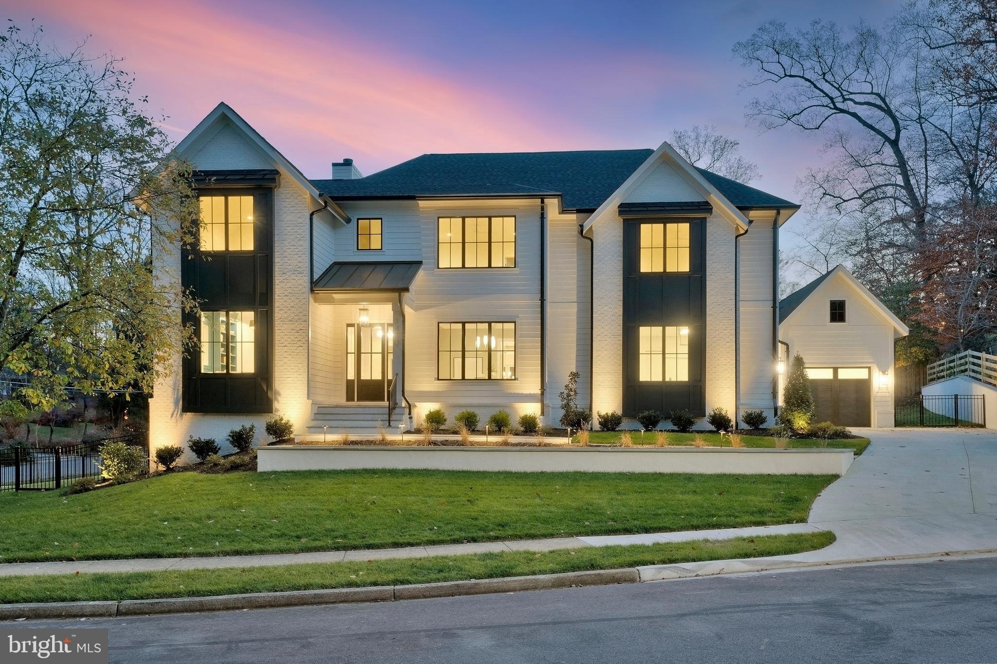 This spectacular new build from MR Custom Homes is intelligently-designed with 6 bedrooms, 6 ½ baths and over 7,450 sq ft of living space on a professionally landscaped .36 acre home-site, with fully fenced yard. The home features an oversized 3-car garage, Hardi-Plank siding, 10’ ceilings on main and upper levels, oversized windows, upgraded crown molding and trim, numerous custom built-ins, designer light fixtures, in-ceiling speakers, and 7.5” white oak engineered hardwoods. 

Entering into the spacious foyer of this elevator-ready home with main level ensuite bedroom, reveals an open floor plan featuring a light-filled family room with a wood-burning fireplace, a home office/study, and an elegant dining area which connects to the gourmet kitchen through a well-appointed butler’s pantry. The spacious kitchen with maple cabinetry, quartz countertops, 48” Wolf Range, 48” Subzero Refrigerator, two Asko dishwashers, two beverage fridges, a built-in pot filler, an oversized center island with second sink and space for 4 stools, as well as a large breakfast area. With direct access to the open deck with gas line for grill and large screened-in porch with stone fireplace, skylights, ceiling fan, recess lighting, heaters, and speakers, with stairs to the lower flagstone patio. 

The upper level features 4 ensuite bedrooms, and a well-designed laundry room. The spacious and light-filled primary suite includes a sitting area, two walk-in custom closets with extensive built-ins, and a gorgeous primary bath with walk-in shower, freestanding tub and dual sink vanity. The fully finished lower level has an open rec room with wet bar and gas fireplace, exercise room, and a guest room with an ensuite bath. McLean High School pyramid; minutes to downtown McLean and Tysons, with easy access to major commuter routes.