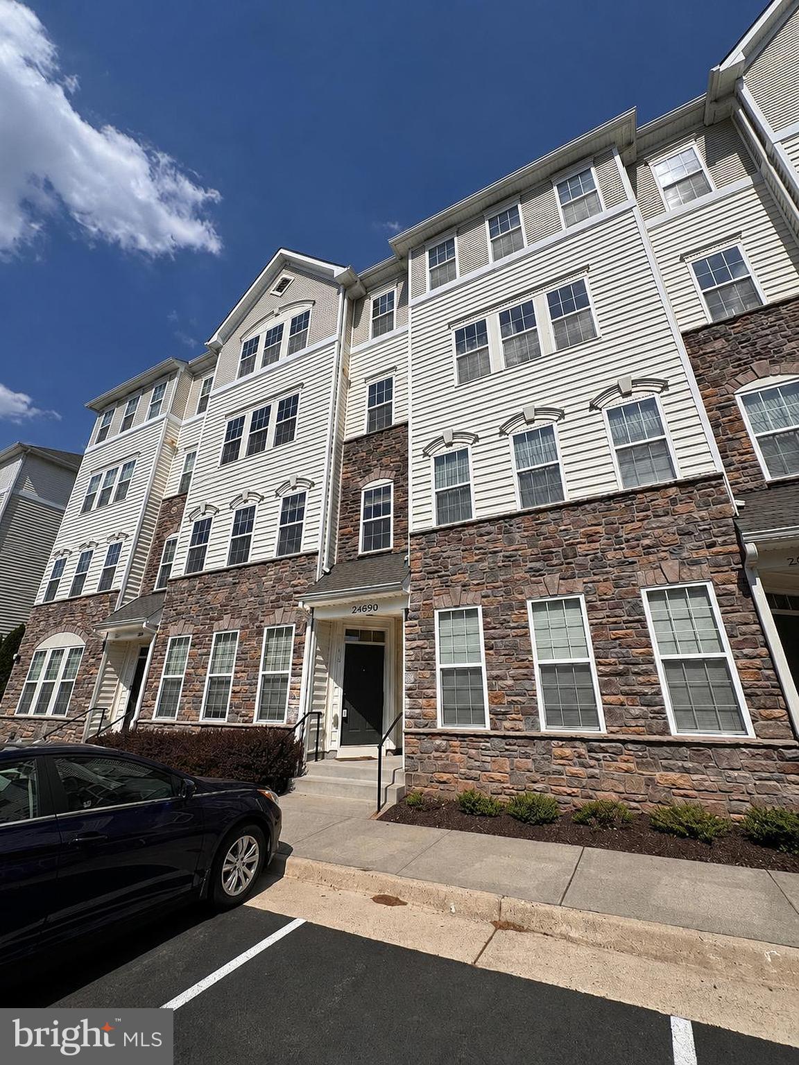 Featuring brand new LVP flooring on the main level, this beautifully maintained and freshly painted 3 bedroom, 2.5 bath townhouse style condo with a spacious loft on the top floor offers approximately 1,638 square feet of thoughtfully designed living space in the sought after Stone Ridge community of Aldie, VA.

The main level welcomes you with a bright, open layout that seamlessly connects the kitchen, living, and dining areas, along with a convenient half bath, making it ideal for everyday living and entertaining. The kitchen is well appointed with stainless steel appliances, granite countertops, a backsplash, under cabinet lighting, a generous pantry, and a new garbage disposal. The main level half bath has also been updated with a new toilet.

Upstairs, the top-level features three well-sized bedrooms, two full bathrooms, a versatile loft space, and a washer and dryer. The primary suite offers hardwood flooring and a bathroom with dual vanities and granite finishes, while the additional bedrooms provide abundant natural light and functional space. Three newly installed ceiling fans enhance comfort throughout the home. A private balcony adds to the appeal.

Additional highlights include a one-car attached garage. Residents of Stone Ridge enjoy access to pools, walking trails, playgrounds, fitness centers, and community events, all just minutes from shopping, dining, Stone Springs Hospital, Dulles Airport, and major commuter routes, making this move-in-ready home an excellent combination of style, space, and location.