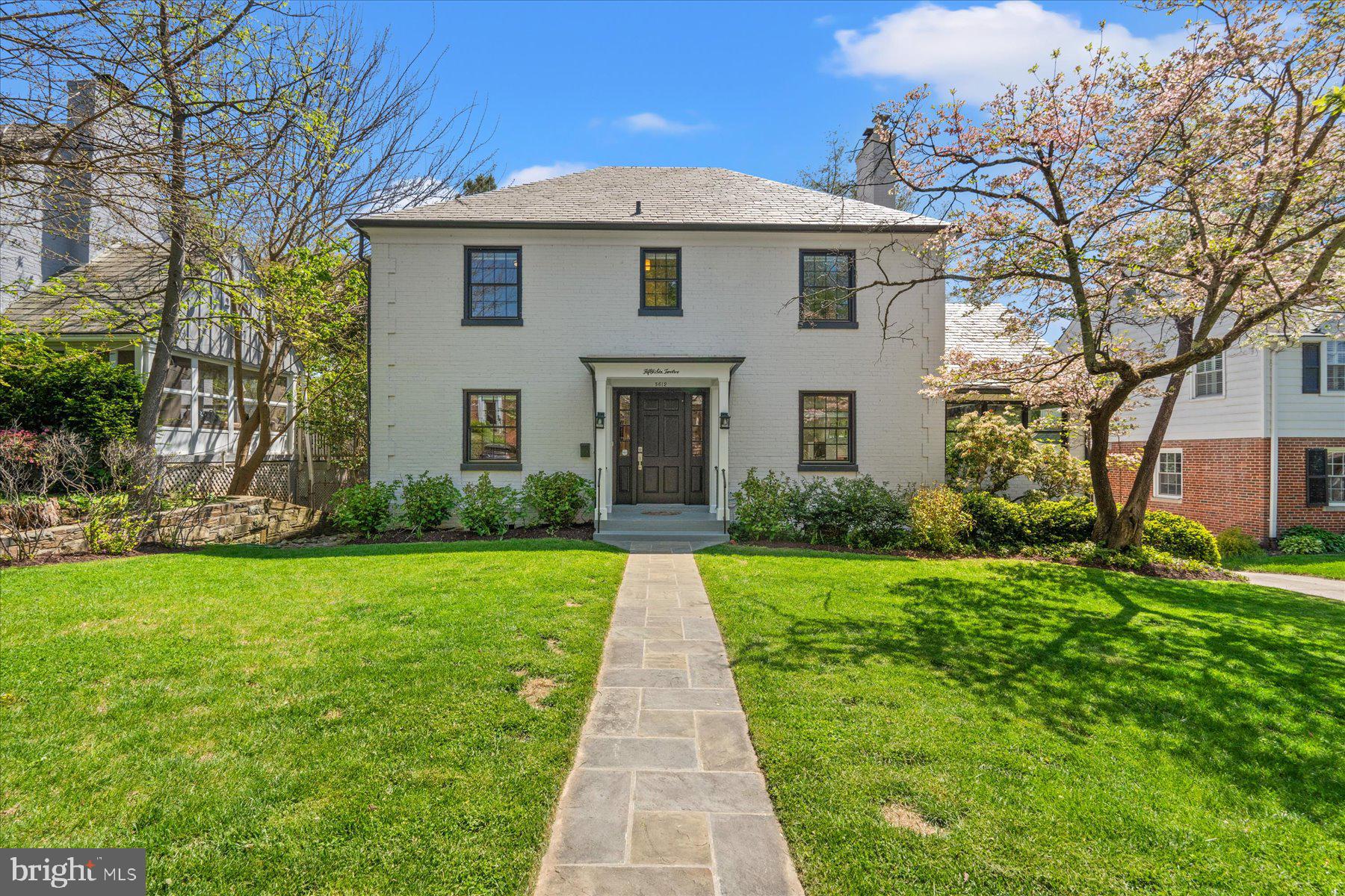 Tucked away in the heart of the sought-after Sumner neighborhood, 5612 Overlea Rd is a stunningly remodeled home offering nearly 4,000 finished square feet of inspired living space, thoughtfully updated in 2021 for today’s modern lifestyle. With 5 bedrooms, 4.5 bathrooms, and a layout that effortlessly balances function and style, this is the home you've been waiting for.

The gourmet chef’s kitchen is the centerpiece of the main level, outfitted with a Viking professional refrigerator and dishwasher, Wolf six burner gas range with a French top, a convenient microwave drawer, and an oversized quartz island perfect for casual dining or entertaining. Flooded with natural light, the home’s open-concept design features updated bathrooms throughout, beautiful custom finishes, and unique architectural elements that add warmth and character at every turn.

The light filled family room with stunning fireplace and sunroom with vaulted ceilings and are located just off the kitchen. These large rooms offer a serene space to entertain, spend time with family or relax. Across the foyer of this center hall colonial is the graciously sized dining room anchored by a striking two-sided wood-burning fireplace. The main level study, framed by walls of windows, exposed brick, vaulted ceiling, and a fireplace—making it a bright and inspiring space to work from home.

Upstairs, four spacious bedrooms await, including a stunning and bright owners’ suite complete with its own wood-burning fireplace, spa-like bath with glass-enclosed shower, dual vanities, and a custom walk-in closet. All bedroom closets on the second floor feature built-in organizers.

The fully finished lower level serves as a true retreat—complete with a second family room, game area, and a private bedroom suite with full bath and separate entrance, ideal for use as a guest, in-law, or nanny suite. A mudroom with laundry conveniently connects the lower level to the attached one-car garage.

Perfectly located just minutes from the Capital Crescent Trail, the exciting new Westbard Square Development, and in bounds for top-tier schools—Woodacres Elementary, Pyle Middle, and Whitman High—this home offers the best of Bethesda living with the convenience of a central location in a tranquil setting. Welcome home!