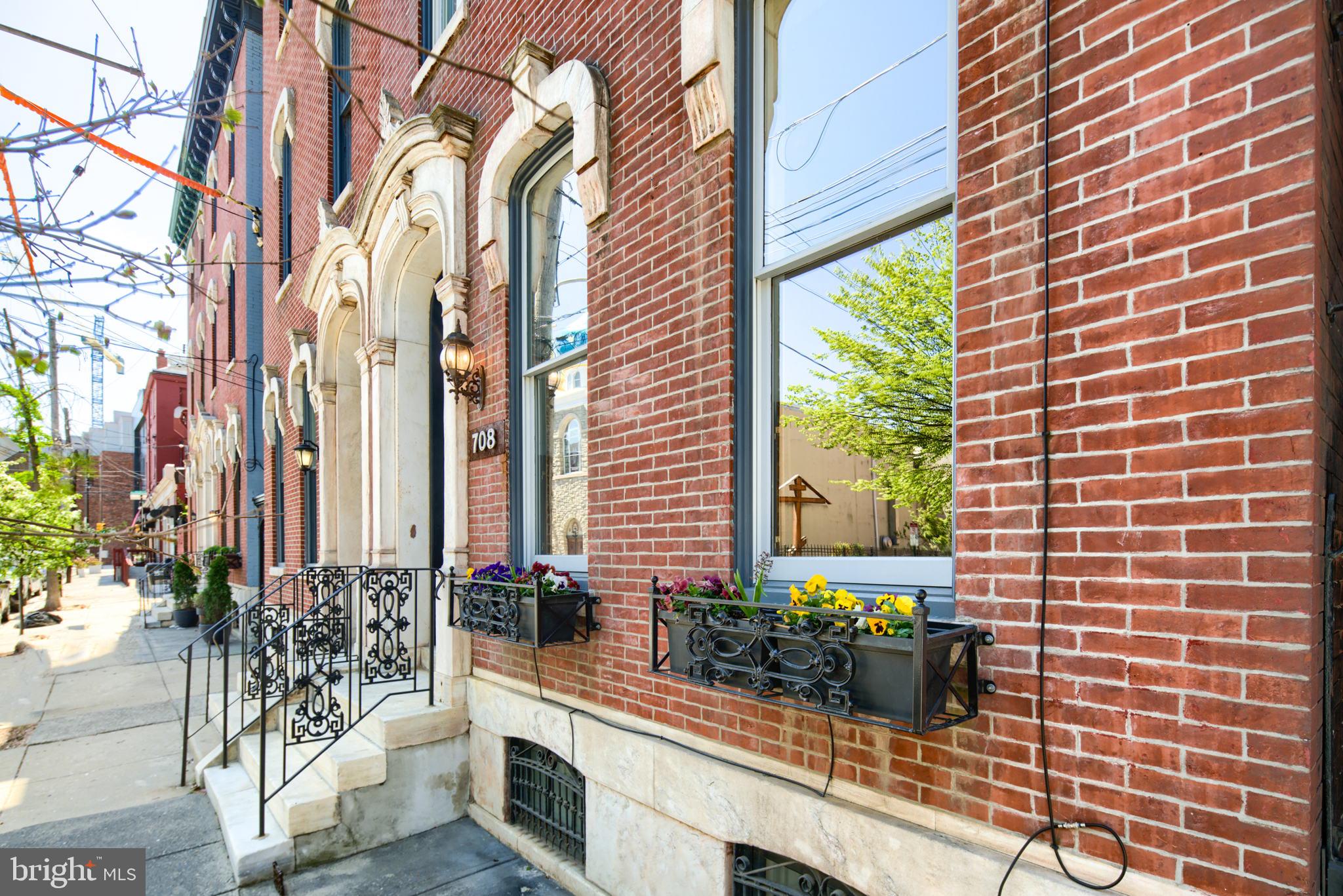 Beautiful 150-year-old Victorian home recently updated with all modern features. This home is ideal for a young family looking to engage with all the city has to offer while being able to retreat home to a large, private residence. All bedrooms are spacious, each with an en suite bath. Huge au pair suite on the top floors with private living/kitchen, making it ideal for a live-in nanny or extended guest visits. Plenty of options for office space and loads of recreation areas for kids and entraining.  Large backyard, home gym, and 1 year of pre-paid, gated parking
A wonderful blend of restoration & modernization, every feature in this home is larger, taller & more spacious with immense windows throughout, bathing the home in natural light. Huge Lot (20 ft by 139 feet) allowing for a large rear yard & side yard with side alley access. Gated Parking a mere 1.5 blocks away + easy street parking. 
Enter up an original grand marble exterior stair, through recreated solid wood twin doors into a grand vestibule/mud room. 1st FLOOR: The grand Parlor space features an original marble fireplace, ample room for a baby grand piano & living room space for family gathering & entertaining. Proceeding to the rear, encounter the original grand staircase with original walnut handrails and spindles. To the right is a large Powder Room, additional closet space and side yard access. Large 8-10 person Dining Room with a fireplace. Kitchen features modern cabinetry, soapstone counters, multiple high-end Stainless-Steel Appliances (oversized refrigerator, double ovens, microwave & convection oven, wine fridge, dishwasher, garbage disposal) ample storage, formal panty room & large island with seating for 4. A casual sun/media room finishes the first floor blending indoor/outdoor living. Lastly, experience the rare, large urban backyard with room for an array of options. 
2ND FLOOR: Huge front bedroom with walk-in closet and en-suite bathroom. Rear Primary Bedroom is a veritable residence on its own! Featuring an original marble fireplace, custom integrated king-sized bedframe, rear double-height lounge with rear deck access and spiral staircase to a 3rd floor loft used as a office/nursery. Moving in the other direction, step up to a walk-through closet, newly upgraded marble Primary bath with huge shower room, free-standing tub, double vanity, water closet & adjoining 2-way laundry room. 
3rd FLOOR: Enormous front au pair Suite with modern fireplace, walk-in closet, laundry space and full bath.  Rear Bedroom with walk-through closet, en-suite bath and rear access to primary bedroom loft suite. 
4th FLOOR: the au pair suite continues up a private staircase to a living room with exposed brick wall, private outdoor space with skyline views, half bath, and custom stainless steel kitchen with Sub-Zero fridge and freezer. 
LOWER LEVEL: large finished front space with a bar (currently a child reading area) and closet space. Rear is semi-finished with workshop, mechanicals and space for storage and home gym. 
PARKING: secure, 2 CAR gated parking at Hoffman & Brown Streets (one year pre-paid @ $250/mo/spot). 
Incredible Location, walking distance to parks, lifestyle, restaurants, bars, community centers. Rare Opportunity to own a late 19c. Mansion. Property has been meticulously maintained and improved during ownership. See attached List of Improvements & Maintenance Log.