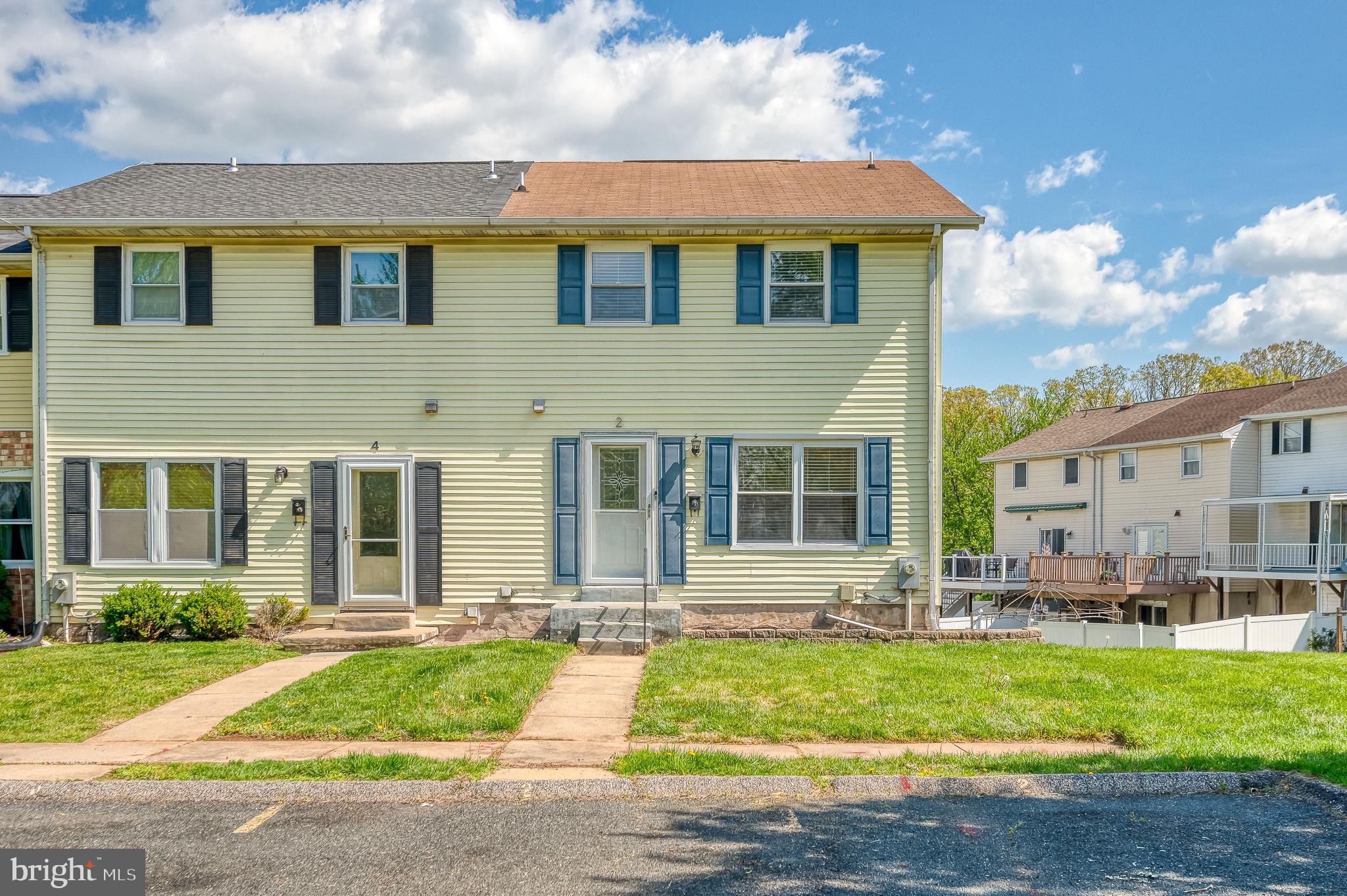 Located in Hazelwood Village, Rosedale, this 3-level Colonial-style end-of-group townhome offers 3 bedrooms, 2.5 bathrooms, and a well-designed layout. The main level features luxury vinyl plank flooring in the kitchen, dining, and living areas, while the finished basement provides a cozy carpeted space. Enjoy outdoor living with a wood deck and fenced rear yard—ideal for relaxing or entertaining. Recent updates include HVAC (2021) and water heater (2022). The HOA covers trash, water, and snow removal.