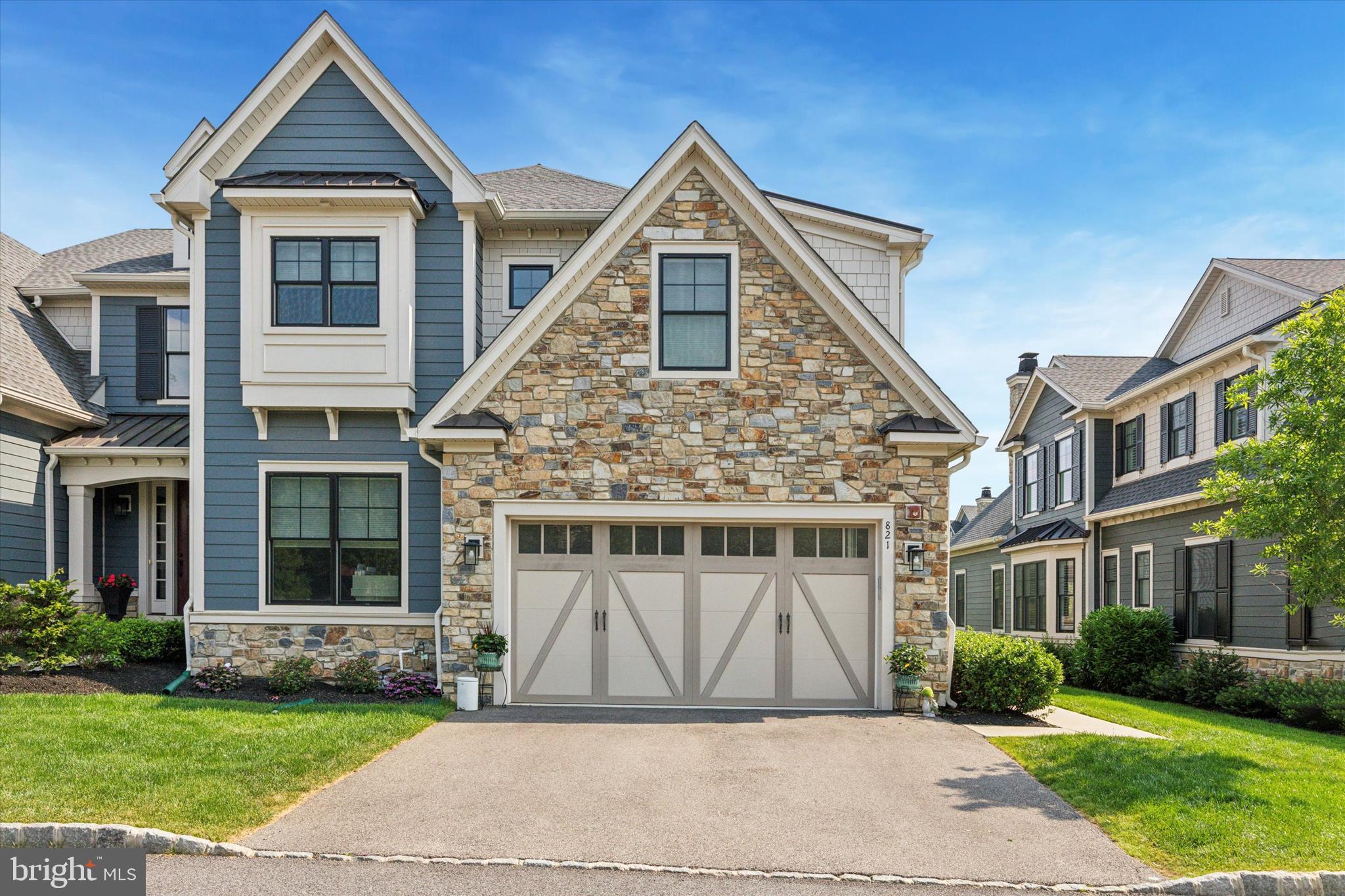 Presenting 821 Greenwich Drive in Mattison Estates, voted 2024 Community of the Year. Back on the market with a new price after undergoing some stylish updates, including new Laundry Room cabinets & countertop, newly painted Bedroom#2, new Hall Bathroom Shower door & new Tiles in the Primary Shower. This is a rare opportunity to buy a Mattison Estates, Dover Model Carriage home WITH ELEVATOR on a PREMIUM lot, only available as the owners are relocating. Since purchasing the home in 2022, the home has undergone some stunning updates including finishing the Basement, new paint & carpet throughout, shiplap in the Family Room, butcher block extension with shelves & cabinets in the Kitchen, new light fixtures throughout, new ceiling fans, new storage shelves in the Basement Storage Room, adding a Generac Generator and now the updates listed above. When you arrive at Mattison Estates you will immediately be in awe of the gorgeous & historic Lindenwold Castle which is located in the community & was designed to resemble Windsor Castle. As you make your way to 821 Greenwich you will notice the picturesque historic homes on Lindenwold Terrace which are located right outside the development, visible from your new front door. Entering the home, you find yourself immediately in the heart of the house, the open concept, Family Room, Dining Room, Breakfast Nook & Kitchen. This space boasts large windows everywhere, delivering an abundance of light with great exposure during the day, modern hardwood floors throughout, high vaulted ceilings & truly stunning light fixtures. The gourmet Kitchen boasts modern cabinetry & quartz countertop space including a custom-built island, stylish subway backsplash tiles, a Pantry & high-end stainless steel appliances! The Breakfast Nook is situated right outside the sliding doors that lead to the Deck, providing a Bed & Breakfast quality view of the exquisitely landscaped common space. This is one of the few homes to have a private, set-back Trex-Deck,  creating inside/outside entertaining space. The Main Floor is completed by access to the 2 car Garage, a Powder Room & the large Office which could be used as a Main Floor 4th Bedroom, or Rec Room. Heading upstairs, the top floor delivers the same modern flooring. To your right is the Primary Bedroom Suite featuring new carpet, recessed lights, a stylish ceiling fan, tons of windows, a reading nook, 2 walk-in-closets with custom shelving & a modern Primary Bathroom complete with a glass framed shower, a double vanity & a separate Toilet Room. To your left, you will find the brand new Laundry Room, the Full Hall Bath that has a separate area for a Double Vanity & the Shower/Tub & 2 large Bedrooms for guests or kids, both with large closets. The Bedroom at the rear of the home provides an incredible view of the community.  The recently finished Basement level, boasts impressive exposed beams, recessed lighting, LED lighting, bar area, a custom-built space for your TV, a Half Bath, a Storage Room & a huge area to use your favorite rec. items such as Gym Equipment, Pool Table etc. Finishing the Basement turned it from an impressive house into an incredible one! If stairs aren’t your thing, the house is serviced by an Elevator that goes to all 3 floors. Mattison Estates is only a 5 Minute walk To Downtown Ambler & all of its amazing restaurants, stores, street festivals, famous Movie Theatre & Train Station & also provides easy access to 309, 276, Mondauk Park, The Promenade & all the restaurants and stores in Spring House, North Wales & Montgomeryville. As you walk around the community, you’ll come across views around the lake area, incorporating some of the historic statues that deliver Mattison Estates' unique character. Don't miss this golden opportunity to buy a premium lot, with high quality finishes & craftsmanship throughout, over 4,000 SQ FT of finished space, stunning front & back views & no views of the 501 Building.  Schedule your showing today!