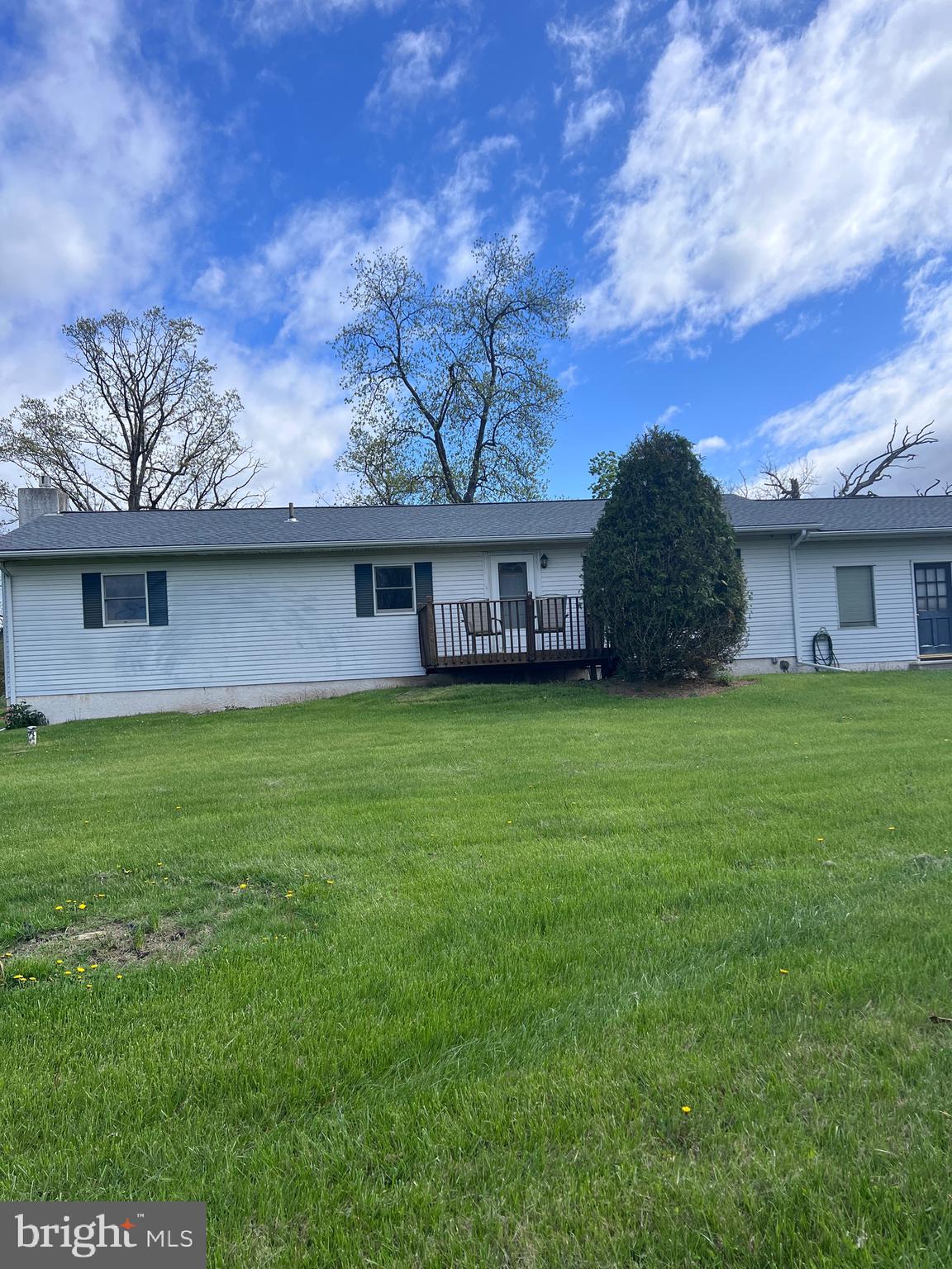 3 BR, 1 1/2 BA ranch with living room, dining room and kitchen.  Full open basement, partially finished with fireplace.  Breezeway for storage and 2 car garage included.   Plenty of parking.  Rear deck.  Beautiful country setting.