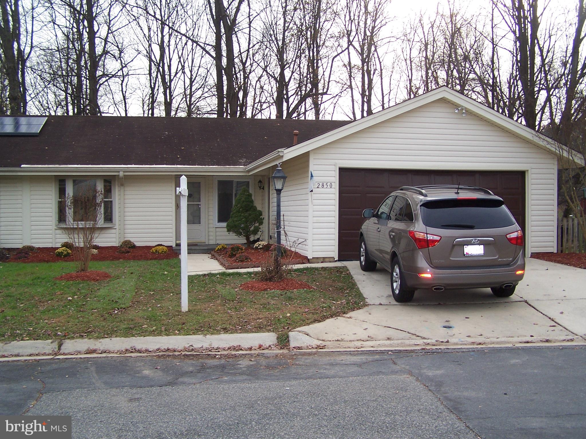 One level living, spacious semi-detached home, freshly painted, new carpet in bedrooms, new laminate floors in living, dining and hallway. Upgraded kitchen with granite counter tops, ceramic floor, ceramic in baths, hallway bath floor with new ceramic. Spacious 2 car garage. Minutes to shops, restaurants, 495/270/200 exits. Low HOA fee, truly a house to keep.