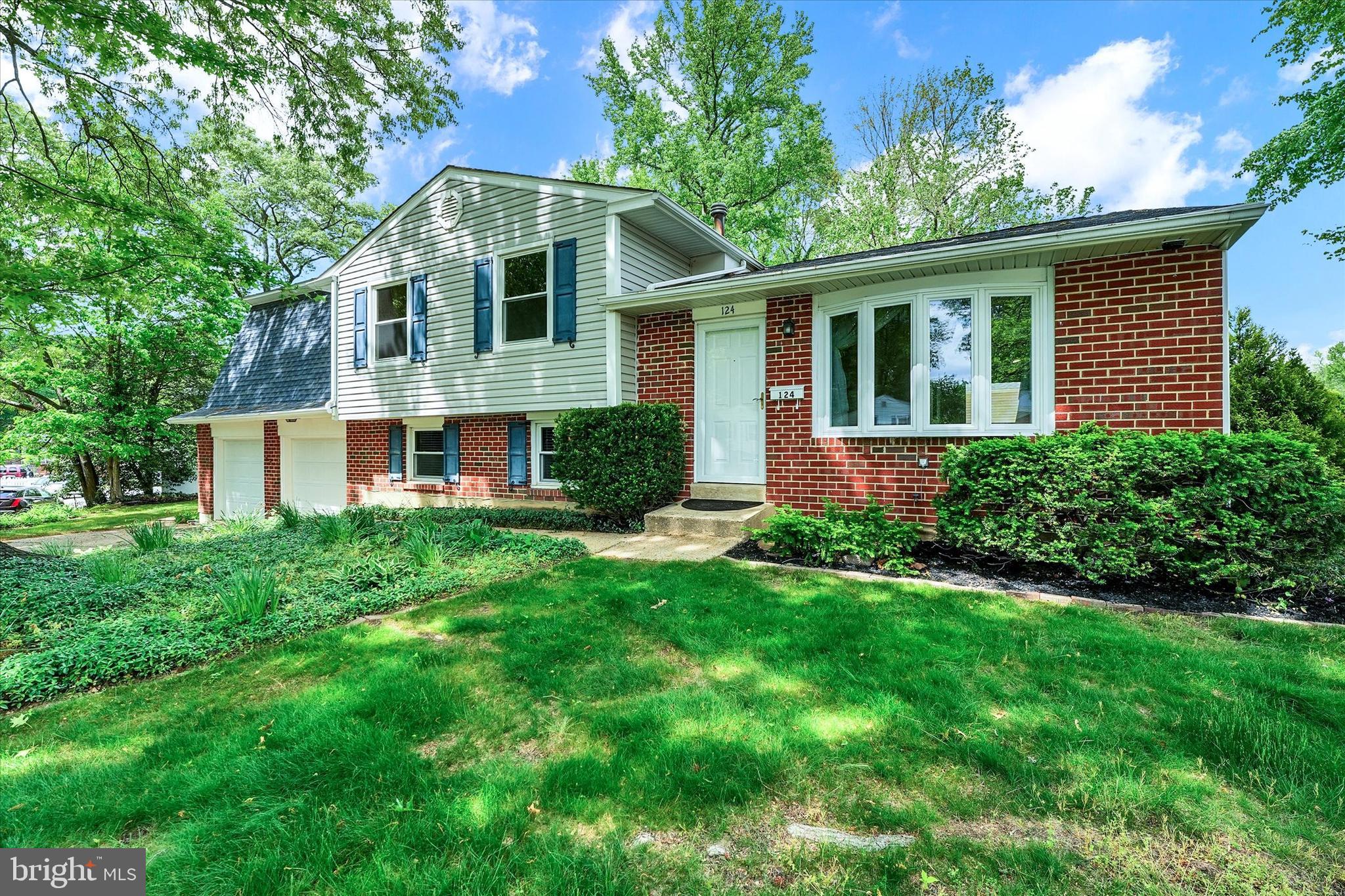 For the past 33 years the Sellers cherished this wonderful home in an exceptional location with easy access to major roads, shopping, restaurants, parks, airports, malls & hospitals. It provides a convenient commute to Wilmington, Philadelphia, Newark and beyond.  Sitting on a spacious corner lot with an oversized two car garage, rear covered patio for relaxing & entertaining, raised garden beds for the gardening enthusiast and useful large shed for extra storage, this home offers a unique combination of charm, function and unbeatable location.  Step inside to find a bright and welcoming living room with a stunning bay window and gorgeous hardwood floors.   The formal Dining Room also features hardwoods , a large casement window and a convenient pass through to the kitchen, perfect for entertaining.  The renovated kitchen is stylish & functional showcasing attractive soft close cabinetry with glass front doors, tasteful solid surface countertops, tiled backsplash, gas cooking & a pantry closet adding to your storage options.  The inviting family room is the picture of comfort with its wall-to-wall brick wood-burning  fireplace, mantel and wood storage pass through to keep you warm & toasty all winter long.  The oversized laundry room with utility sink and walk out to rear covered patio for easy garage access is a wonderful way to enter the home and drop your backpacks, athletic gear and to bring in your groceries.  The newly renovated powder room is located perfectly for access from several areas of the home.  Downstairs the expansive basement offers incredible flexibility with space as a workshop, craft area, storage room all waiting to be utilitzed for your specific needs!  Upstairs the Primary Bedroom Suite includes hardwood floors, two closets and a full en-suite bathroom with a glass enclosed shower.  Two additional Bedrooms also feature hardwood flooring and share a fully renovated hall bath with a beautiful tiled tub surround.  This home is truly move-in condition and is ready for the new owner to cherish for years to come.  You won’t find a home at this price offering more value as a great home in a great location!   Schedule your tour today and don’t miss your opportunity to make this gem your new home.  Room measurements and square footage listed are estimates and should be verified by Buyer.