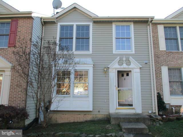 Laurel Woods features 3 finished levels of Living Space in this town home . Open floor plan on main level has huge living room , powder room &  dining area . Kitchen has pantry & breakfast bar with door to rear deck .Walk down stairs to back yard. Upper level features  3 bedroom with generous closet space & full bath. Lower level has family room, full bath ,storage & laundry area.Walk out level !!