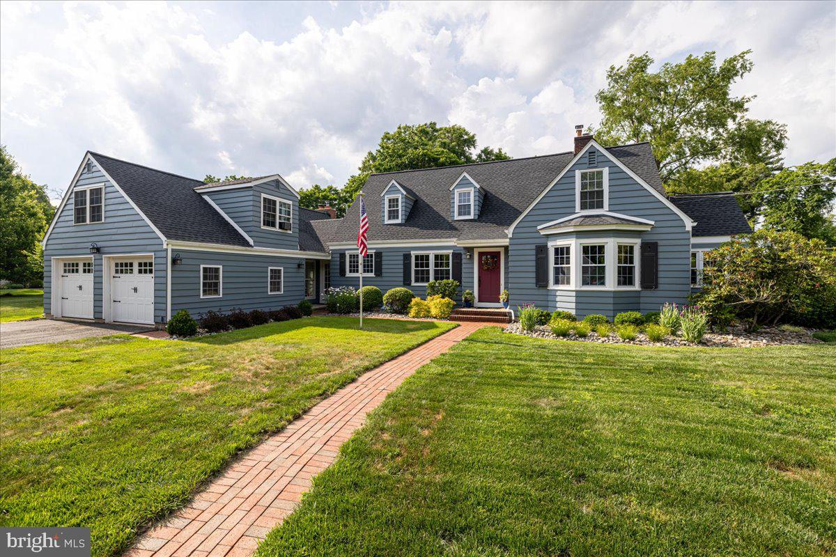 Welcome to 6 East School Lane, a one of a kind OASIS, spacious yet cozy five bedroom home in the quiet neighborhood of Lower Makefield, Yardley.  Spectacular Floor plan with 2 Primary Bedroom options.  One upstairs and one on the main floor.  Guests enter through the front door, and are greeted by the hardwood floors and impeccable details throughout. Continue to the left of the entryway to find the dining room, an open space that connects to the updated kitchen. The kitchen offers a large double sink overlooking the front yard, stainless steel appliances and a breakfast room overlooking the back yard. To the right of the entryway find comfort in the huge living room, decorated by an expansive fireplace with brick surround and flaked by charming built-ins. Step through to the sun room along the far right side of the home that makes for a perfect office or play room, exercise area . Find two bedrooms on the first floor of this expansive home, each with spacious closets and windows for natural light. Upstairs, enjoy a loft-style living overflow space, another bedroom with ensuite and a master suite. The tranquil master offers incredible cathedral ceilings, his & her closets and a beautiful en suite bathroom with double sinks and a stall shower. Find additional entertaining space in the phenomenal great room with 18 ft ceilings, multiple windows, The circular staircase to the loft that is being used as a guest bedroom - it is the 5th bedroom or could be used as a second office, a full bathroom with stall shower, and repurposed barn wood that details the space. This room offers glass french doors that open to the kitchen and a second set of glass french doors that open to the back breakfast room. This sunny space leads directly into the backyard, a serene and lush oasis with a large deck with dining space, patio and beautiful in-ground pool. This home is complete with a finished basement with a laundry room and workshop room, a two car garage and an aesthetically professionally landscaped yard. Newer shed and fence.  6 East School Lane is just steps away from Makefield Elementary school, a short walk to the Delaware Canal Towpath, and a short drive to entertainment such as Sesame Place, Yardley Golf Course and restaurants and shopping. Find easy access to major PA and NJ roadways, the Yardley Train Station on the West Trenton Line and great shopping centers. Do not miss your chance to own this truly uniquely beautiful home in its excellent location! This one is a real gem!!!