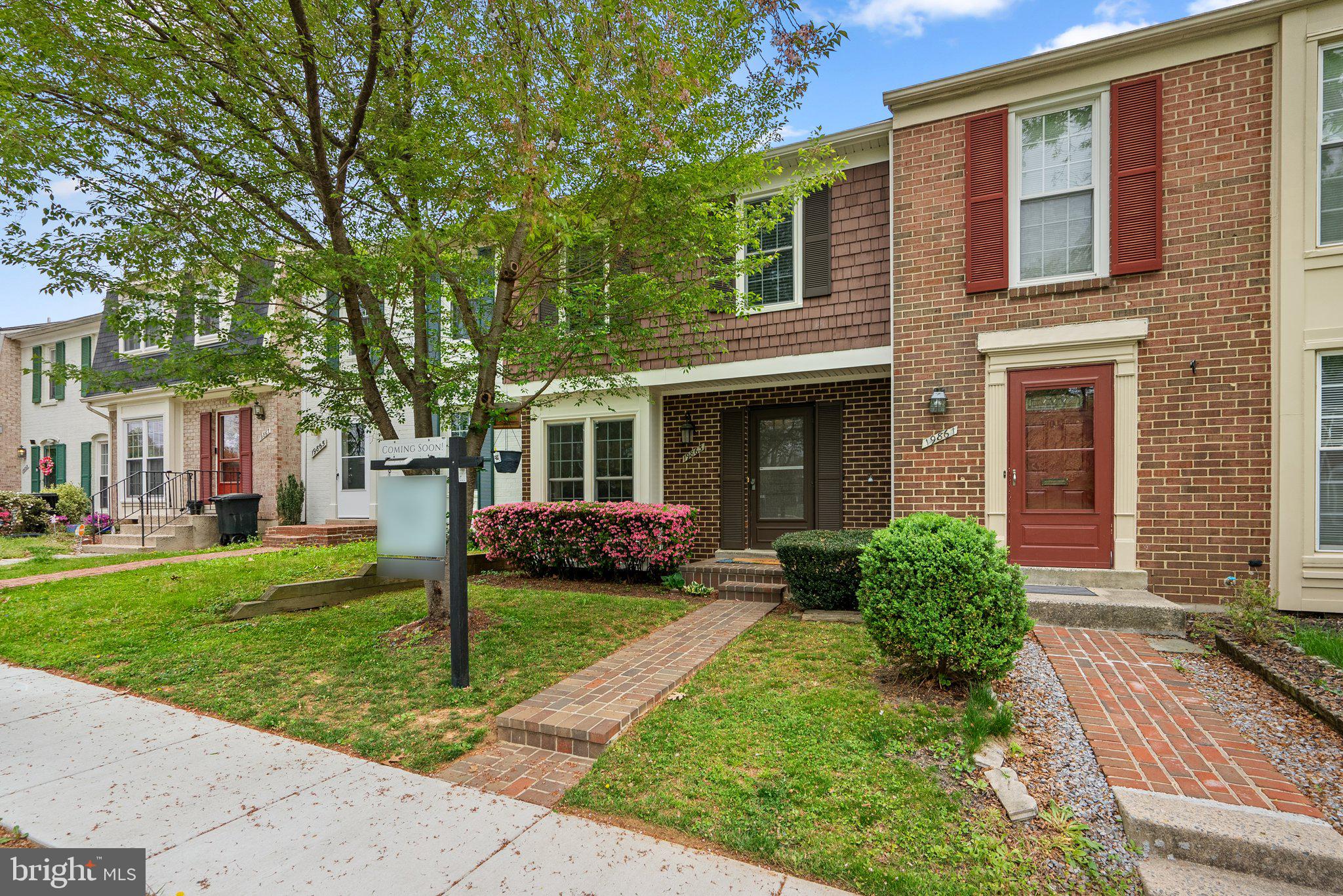 This well-maintained three-bedroom, two-and-a-half bath townhome offers comfortable living in a convenient location. The main level features wood floors throughout and a spacious living room with access to a composite deck—perfect for outdoor dining or relaxing. The galley-style kitchen has been updated with white cabinetry and granite countertops, offering a clean, modern look with efficient use of space. A separate dining area is just off the kitchen. Upstairs, you’ll find three bedrooms and two full bathrooms, including an en-suite in the primary bedroom. The lower level includes a large rec room, a utility/laundry room, and a sliding glass door that opens to a fenced-in rear yard with a flagstone patio—great for entertaining or letting pets play. As a Montgomery Village resident, you’ll enjoy access to an array of community amenities including multiple swimming pools, tennis and pickleball courts, a recreation center, scenic walking paths, and beautifully maintained parks and playgrounds. With nearby shopping, schools, and easy commuter access, this home blends comfort, convenience, and community living.