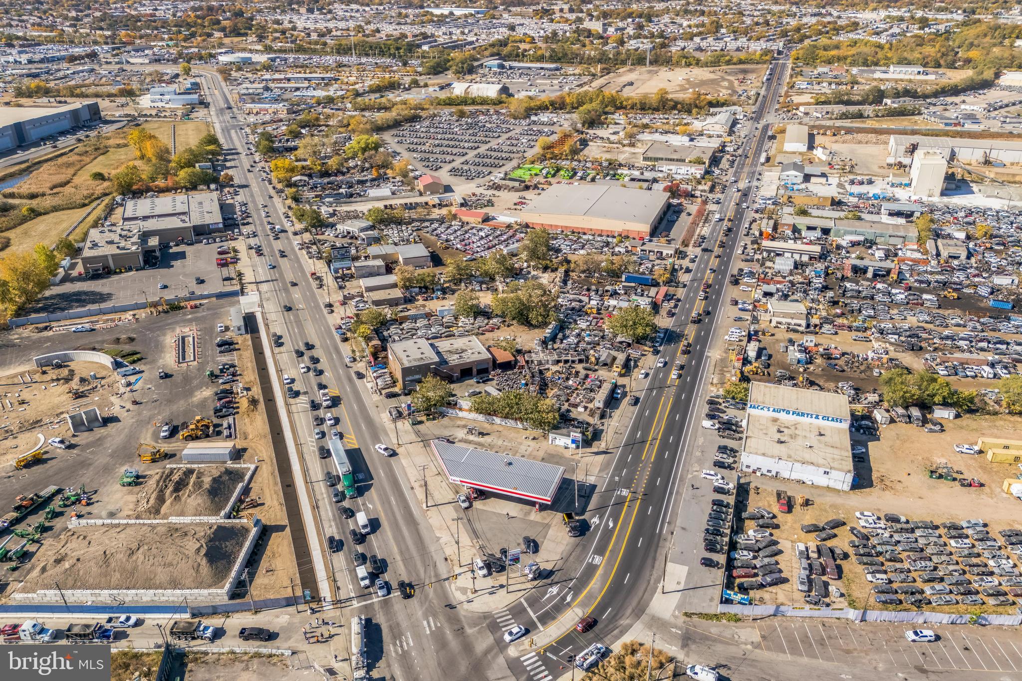 This rare 1.4-acre industrial property with I-3 zoning and an 8,160 square foot
flex/warehouse building offers a varied opportunities in a surging area of the
Philadelphia industrial market. A surge of recent activity in the area is demonstrating the tremendous value this pocket of the city can provide for a variety of business and logistic uses. The property sits just across the river from the new Bellwether District, a 17.5 million-square-foot industrial and life sciences project at the
former site of the Philadelphia Energy Solutions refinery. Right across the street, the new 5 acre soil recycling facility project by Alterra is well underway. This prime location on West Passyunk Ave offers easy
access to major transportation hubs, including I-76 , I-95, Philadelphia International Airport, and the growing epicenter of Philadelphia industrial. The Philadelphia Navy Yard complex is 10 minutes away. The property has direct access from both W. Passyunk Ave and S. 61st St, providing high visibility with over 64,000 vehicles per day along Passyunk Ave and 52,000 vehicles per day along 61st Street. With other anchor
industrial businesses all around, this area is bustling with development and is on track to being a key hub in the future of Philadelphia’s industrial market. This multi-tenant property generates over $28.5k in per month in rent with an additional $16.5k per month attainable from currently owner occupied space and the potential to generate approximately $59k per month upon fully utilizing the property and bringing each space to market rate.  It is configured for both rental income and owner use, with a mix of month-to-month tenants and owner-occupied spaces, offering flexibility for future development.
The main building includes a front office, two drive-in entrances with roll-up doors, and a spacious garage and warehouse, sixteen feet clear-height ceilings, ideal for a variety of industrial uses. The property also features two apartments, a rear garage and warehouse, and a detached four-car garage for additional storage or workspace.

Recent upgrades have generated additional value, including newly coated roofs this year
and replaced Central A/C and heating systems throughout. There are three electric
service meters, one being 3-phase, and the property includes two 80-gallon water
heaters. Additionally, it is well-equipped with an in-ground lift operated by air
compressor, three above-ground lifts (approx. 11,000 lb capacity), and three floating I-
beam rail hoists (with capacities ranging from 30-40 tons), perfect for heavy-duty
operations. With two mobile trailer offices included in the sale, the property offers flexibility for
various business needs. 

This industrial property, with its extensive features and prime location, presents a
unique opportunity for investors or business owners looking to capitalize on the area's
growth and connectivity and central location.