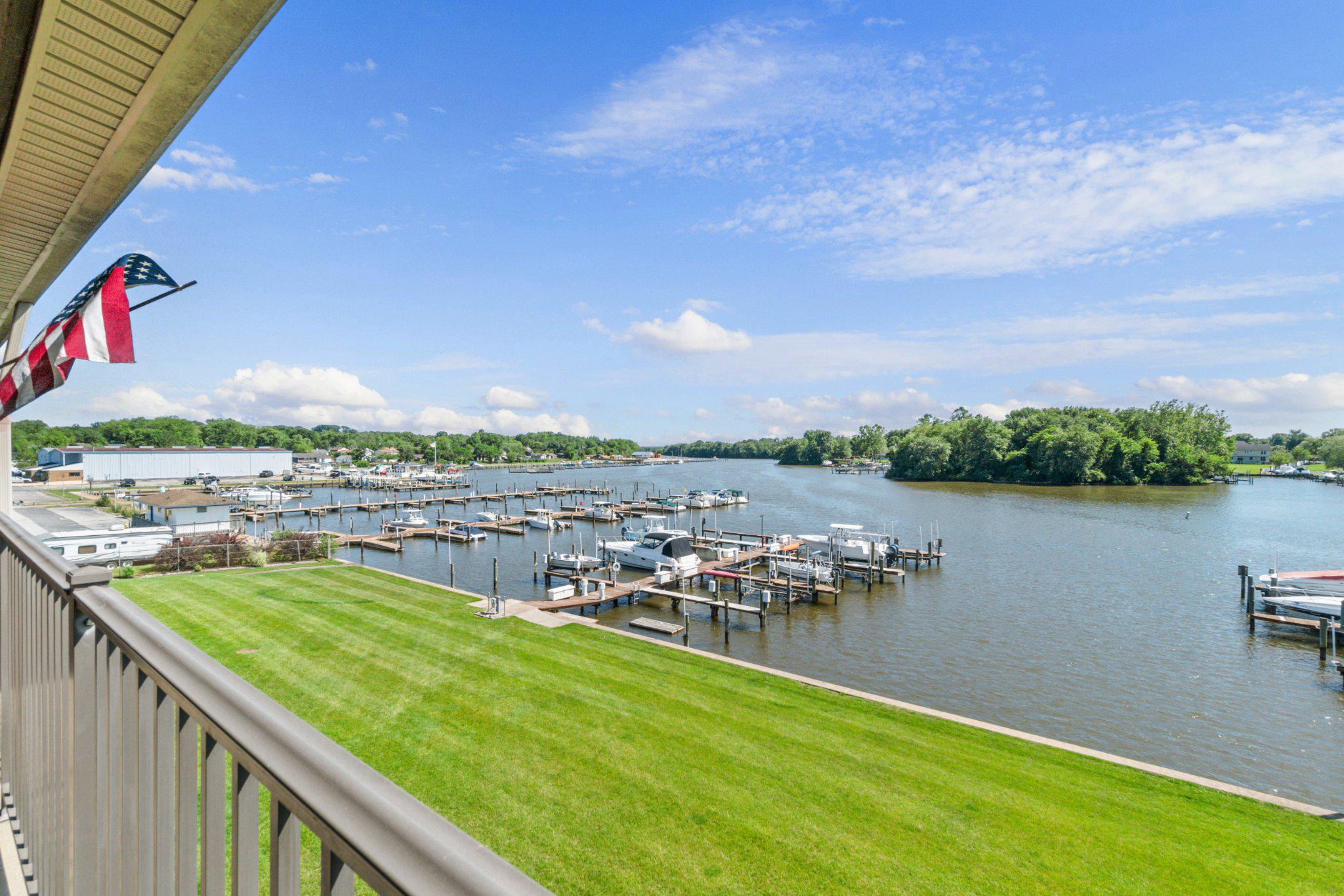 A view that truly steals the show. Perched atop the building, this penthouse condominium offers a front-row seat to some of the most breathtaking waterfront scenery on the Gunpowder River. From the moment you walk through the door, your eyes are immediately drawn beyond the walls of the home to the sparkling water, abundant wildlife, and ever-changing panorama that creates a living work of art every single day. Simply put, the view cannot be overstated.

Designed to maximize the spectacular setting, the open-concept living and dining area is flooded with natural light and seamlessly connected to the outdoors through dual sliding glass doors leading to a private waterfront balcony. Whether enjoying your morning coffee, watching boats pass by, or taking in a stunning sunset over the river, this is a space you'll never want to leave.

The thoughtfully designed interior features a spacious bedroom complete with a walk-in closet, a full bathroom, convenient in-unit laundry, and comfortable living spaces that allow the breathtaking waterfront backdrop to remain the focal point. Recent improvements include fresh neutral paint, updated LVP flooring, new carpeting, an updated HVAC system, and an updated hot water heater, providing peace of mind for years to come.

Adding to the appeal is a deeded boat slip, offering direct access to the Gunpowder River and making this an ideal opportunity for boating enthusiasts and waterfront lovers alike.

Rarely available and offering a lifestyle that feels more like a waterfront retreat than a condominium, this exceptional penthouse residence combines low-maintenance living, a deeded boat slip, and million-dollar Gunpowder River views that must be seen in person to be fully appreciated.