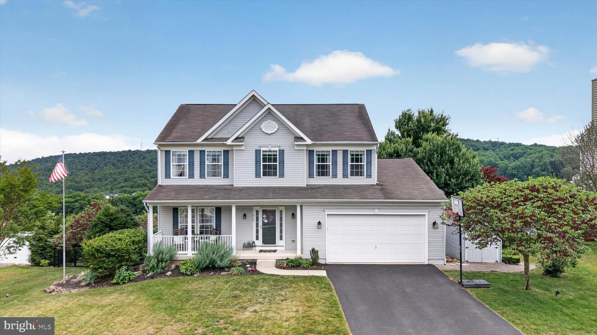 Prepare to be captivated by this stunning 6-bedroom, 3.5-bath Colonial home in the highly coveted Briarcliff community! Nestled on a premium ridge lot, this property delivers the absolute crown jewel of outdoor living: a true million-dollar, panoramic view of the mountains and rolling valley below.

Step inside to find a freshly painted, light-filled interior boasting an expansive open-concept layout, gorgeous Brazilian cherry hardwood floors, custom Amish built-ins, and a cozy gas fireplace in the family room. The bright, white kitchen is a chef’s dream, featuring stainless steel appliances, premium granite countertops, a modern tiled backsplash, and an island with an attached breakfast bar. Seamlessly flowing from the kitchen is a sunlit breakfast nook and a dramatic morning room framed by cathedral ceilings, both perfectly positioned to capture that morning light over the ridge. Gourmet kitchen updates include a premium Culligan Total Defense Reverse Osmosis water purification system (installed 2021), delivering pure, bottle-quality drinking water right from the tap!

Upstairs, the oversized primary suite serves as a true retreat with an updated luxury bath and an expansive walk-in closet. The fully finished, walk-out lower level adds massive square footage, complete with a game/play room, a full bath, and two additional bedrooms—ideal for guests, a home office, or a gym!

The spectacular backyard oasis is designed for ultimate relaxation and entertaining. Step out onto the premium, maintenance-free composite deck to take in those endless long-distance valley views. Afterward, head down to the lower patio and unwind in your private hot tub, which is fully included with the home!

An absolute must-see property in the West Shore School District with an underground propane tank for maximum utility flexibility. With 4 upper-level bedrooms and 2 lower-level guest rooms, this house has room for everyone. Schedule your tour —opportunities to own a view like this do not come around twice!