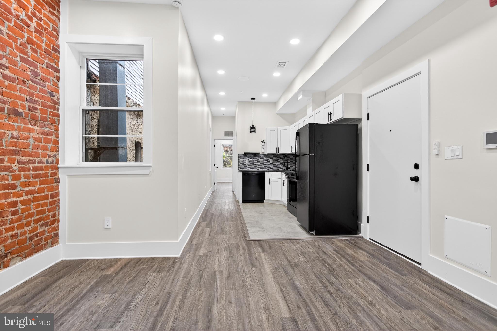 REO Sale — Now Offered at a Significant Price Adjustment.
This mixed-use triplex just steps from Temple University’s Main Campus presents a strong value-add opportunity with excellent cash-flow potential. With projected gross rents of approximately $52,800/year and a pro-forma 9.5% cap rate, this property is ideal for investors seeking scale, upside, and multiple income streams.

The building features a bi-level commercial space on the first floor—an open, flexible shell ready for a barber shop, salon, or service-oriented tenant. Above are two full-floor 2BD/2BA residential units with spacious layouts and strong rental appeal in a high-demand corridor.

The property is currently vacant, offering investors the ability to complete needed improvements, reposition the commercial space, or finish renovations without tenant disruption. With its location, size, and projected income, this property represents a compelling opportunity for both long-term investors and value-add operators.

With projected market rents of $4,400/month (≈ $52,800/year), this asset delivers a strong income profile. After expenses, the building produces a projected NOI of $42,553, making this an attractive opportunity for buy-and-hold investors seeking solid returns in a rapidly developing corridor.

The property features a bi-level white box commercial space on the first floor that has a layout perfectly suited for a barber shop, salon, or personal-service business. The space is ready for an investor or entrepreneur to complete and capture commercial income immediately.  Upstairs are two full-floor residential units, each configured as 2 bedrooms / 2 bathrooms, spanning the entire 2nd and 3rd floors. These units offer spacious layouts, strong rental appeal, and excellent upside—especially in a market where well-located 2BR units near Temple can command premium rents.

The building is currently vacant, allowing for a full renovation strategy, immediate repositioning, or lease-up without tenant interruptions. Whether you’re an investor seeking cash flow, value-add potential, or long-term appreciation, this property presents a rare opportunity at a compelling price point.