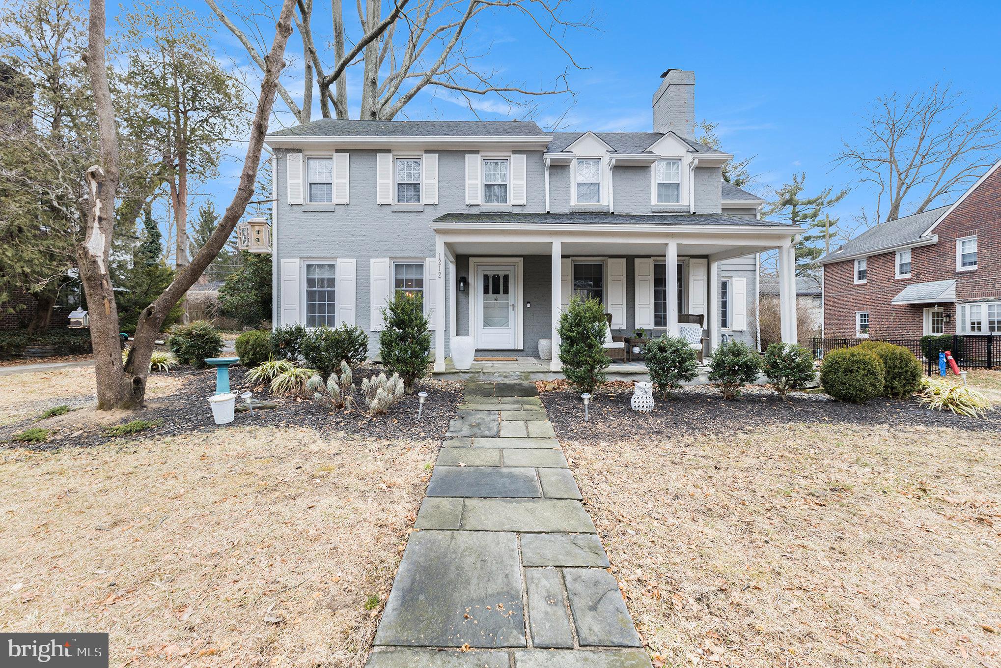 Welcome home to 1212 Yarmouth Rd, a rare gem where prime location meets exceptional condition in the highly coveted Greenhill Farms neighborhood! This stunning 4-bedroom, 3 full and 2 half-bathroom residence exudes timeless elegance, boasting 3,153 square feet of meticulously maintained and thoughtfully updated living space. From the moment you arrive, the home's stately brick exterior, lush landscaping, and inviting paver walkway create an enchanting first impression. A charming, covered porch welcomes guests inside, where refined craftsmanship and sophisticated finishes set the tone for this remarkable home. Step into the grand foyer, where an open-concept main level unfolds before you. To the right, a sprawling living room features a cozy fireplace and oversized windows that flood the space with natural light, offering picturesque views of the outdoors. Adjacent to the living room, a versatile den—complete with its own fireplace and built-in shelving—provides the perfect setting for a home office, reading nook, or relaxing retreat. On the opposite side of the foyer, the chef’s kitchen is a true showstopper. Designed for both functionality and style, it boasts a large center island, granite countertops, custom 42-inch cabinetry, a sleek quartz backsplash, elegant pendant lighting, a farmhouse sink, a wine fridge, and top-of-the-line appliances. A convenient connection to the two-car garage ensures effortless access. The adjacent dining room offers an ideal space for gatherings, highlighted by a charming bay window with a built-in window seat and elegant wall sconces that enhance its warm ambiance. Throughout the main level, hardwood floors, intricate crown molding, abundant natural light, and a stylish powder room complete the inviting atmosphere. Upstairs, the primary suite is a sanctuary of luxury. This expansive retreat features a spa-inspired En-suite bath with Carrera marble, an oversized spa shower, and a spacious walk-in closet with a built-in vanity area—along with two additional outfitted closets, ensuring ample storage. The generously sized secondary bedrooms will not disappoint, including a private en-suite bedroom and two additional bedrooms that share a well-appointed Jack-and-Jill bathroom. The finished lower level is the perfect space for entertaining, fitness, or relaxation, featuring newer flooring, deep window wells that infuse the space with natural light, a dedicated storage room, and a convenient guest bath. Situated in an unbeatable location, this home is within walking distance to a community park and bark park, with easy access to top-rated schools, dining, public transportation, major roadways, and the vibrant city of Philadelphia. Don’t miss this extraordinary opportunity—schedule your private tour today!