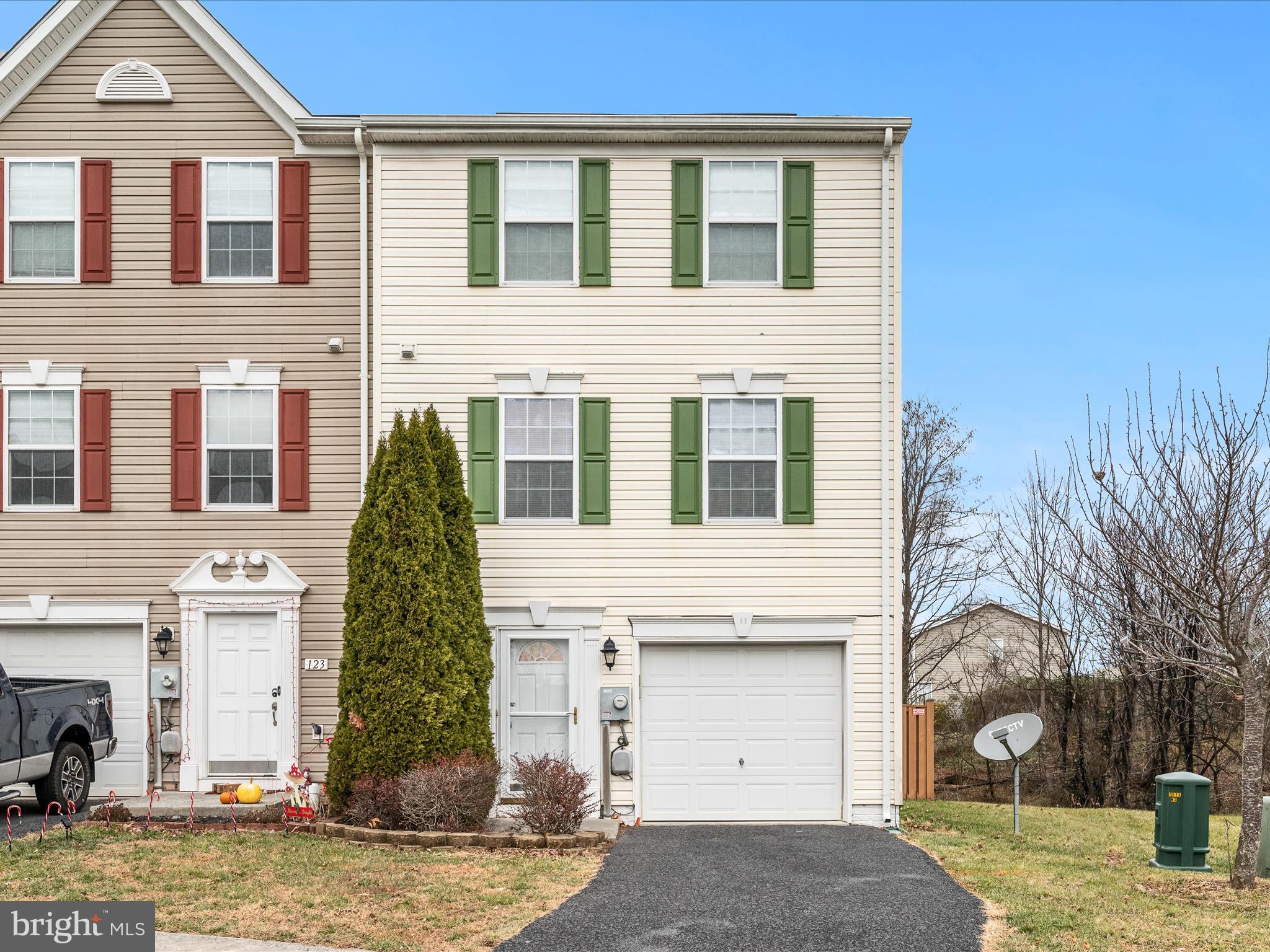 Price Reduction! Welcome to this beautifully maintained end-unit townhome, perfectly situated in a sought-after commuter-friendly location on the east side of Winchester! With 3 bedrooms, 2 full baths, and 2 half baths, this home offers an ideal blend of space, comfort, and convenience. Step inside to discover an inviting layout featuring a bright and airy living room, a modern kitchen with ample cabinet space, and a dining area that’s perfect for entertaining with access out to the deck. Upstairs, the primary suite boasts a private bath and generous closet space, accompanied by two additional bedrooms and a full bath. The lower level offers a cozy family room or flex space, complete with a convenient half bath and access to the attached garage. Outside, you’ll find one of the largest yards in the community—a fully fenced oasis that’s perfect for gardening, pets, or outdoor gatherings. This property’s end-unit positioning provides added privacy and natural light throughout. Located just minutes from major highways, shopping, dining, and local amenities, it’s a dream home for commuters and those seeking both convenience and comfort. Great investment opportunity!