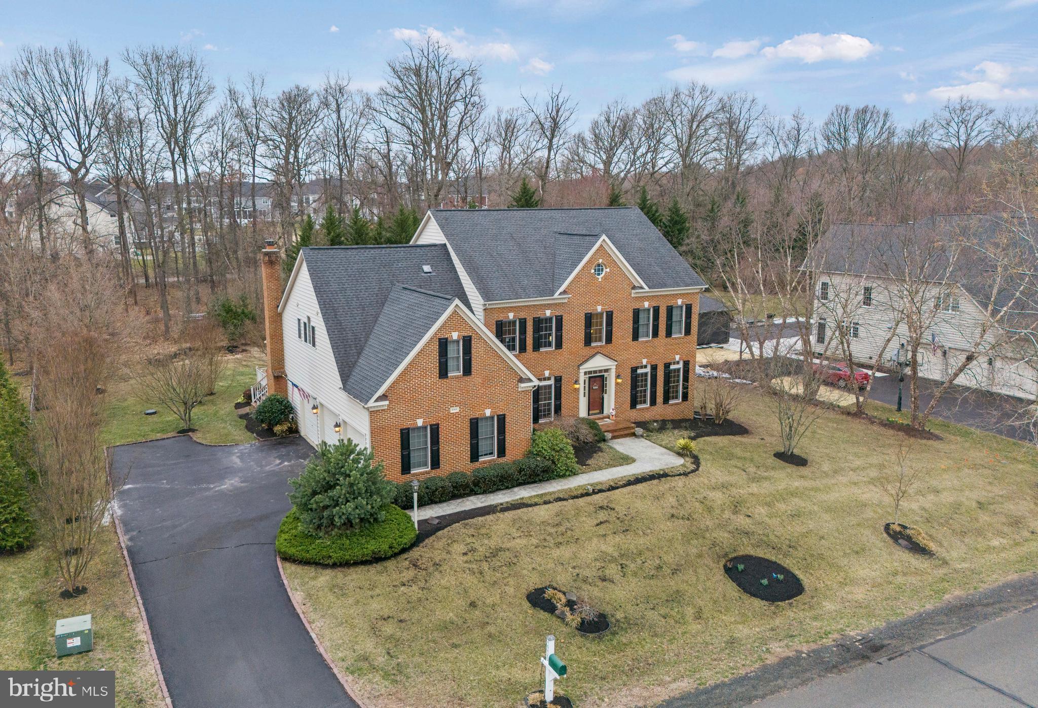 Experience grandeur and refined living in this spectacular Winchester Belmont model home, nestled in the prestigious Lenah Run community. Positioned on a spacious .80-acre lot surrounded by serene woods, this estate is the epitome of luxury living in Northern Virginia.
As you enter, you're greeted by the majestic family room, characterized by its high vaulted ceilings and large windows that illuminate the space with natural light. The room's sophisticated paneling and classic fireplace set the stage for elegant gatherings, opening to an upgraded Trex deck, seamlessly integrating indoor comfort with outdoor entertainment.
This home boasts a new HVAC system installed in October 2023 and features rich hardwood floors that lead you through its open, airy layout. The gourmet kitchen is a chef’s delight, equipped with granite countertops and stainless-steel appliances, ideal for preparing gourmet meals. The expansive master suite offers a private retreat with its sitting room, luxurious master bath, and spacious walk-in closets.
The well-appointed lower level, complete with a wet bar, is perfect for year-round entertaining, offering additional space for relaxation and socializing. This estate is further enhanced by community amenities such as a pool, walking paths, and more, ensuring a vibrant lifestyle.
Perfect for those accustomed to a life of leisure and hosting, this home in the Goshen Post, Willard, and Lightridge school pyramid, combines the essence of a peaceful retreat with the functionality and grandeur suitable for high-end entertaining.