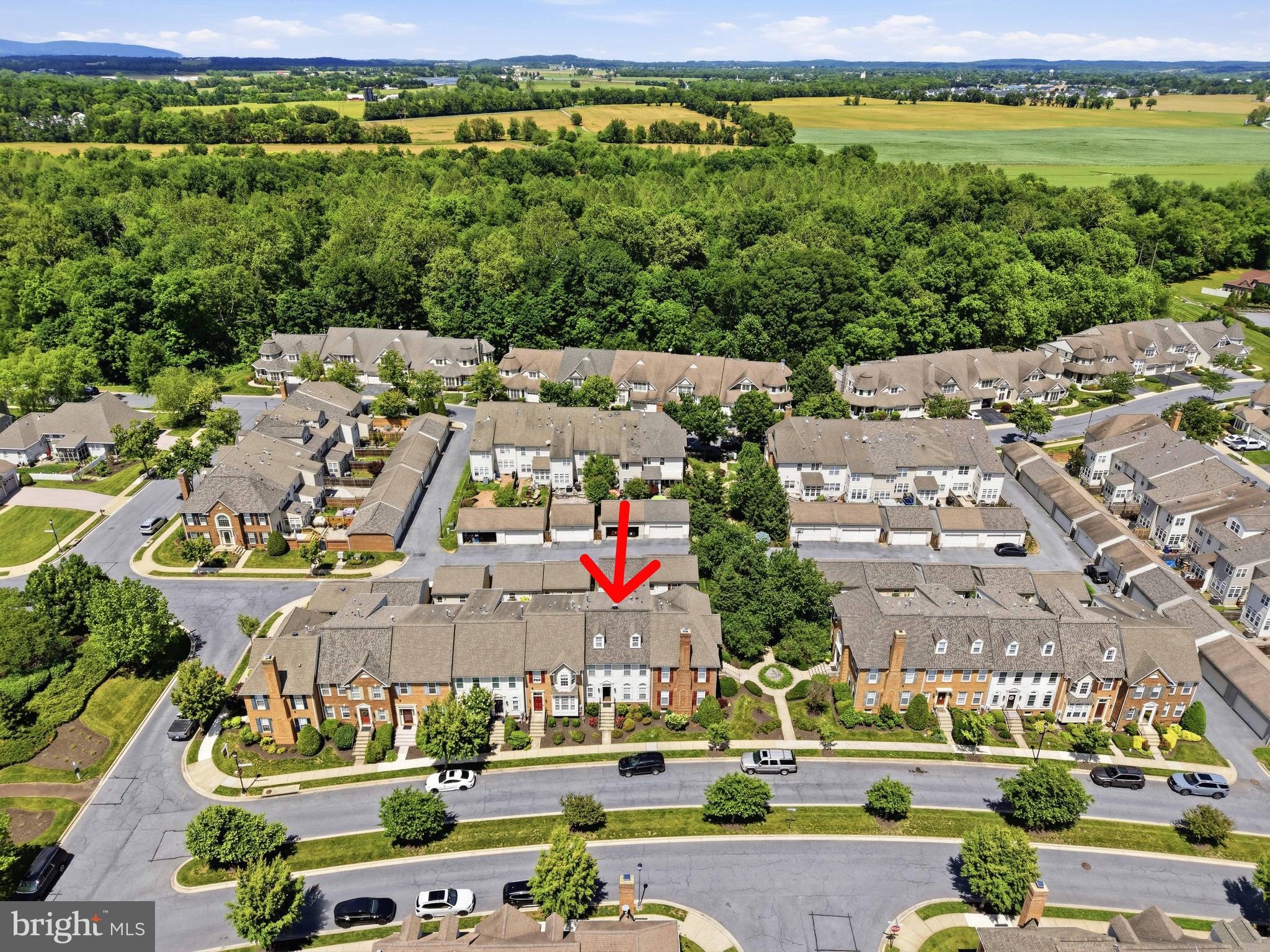 Perfectly situated in the sough after community of Womans Mill, this spacious townhome offers three bedroom, two and a half baths and a bonus third level family room adjoining the primary suite. The second level features the convenience of a dedicated laundry area.  The main level boasts hardwood floors, a formal living room, dining room, and an eat-in kitchen with easy access to a fully paved rear yard and detached two car garage.  The unfinished lower level provides excellent storage or future expansion potential.  Competitively priced and being sold as-is as part of an estate sale.  Home inspections are welcome for informational purposes only.  No known defects.  It is believed that the roof and HVAC system are less than six years young. Any furnishings/chattle remaining at settlement will convey with the property . Lovingly maintained by its original owner and first occupant, this home presents a wonderful opportunity to add your personal touches while building instant equity.