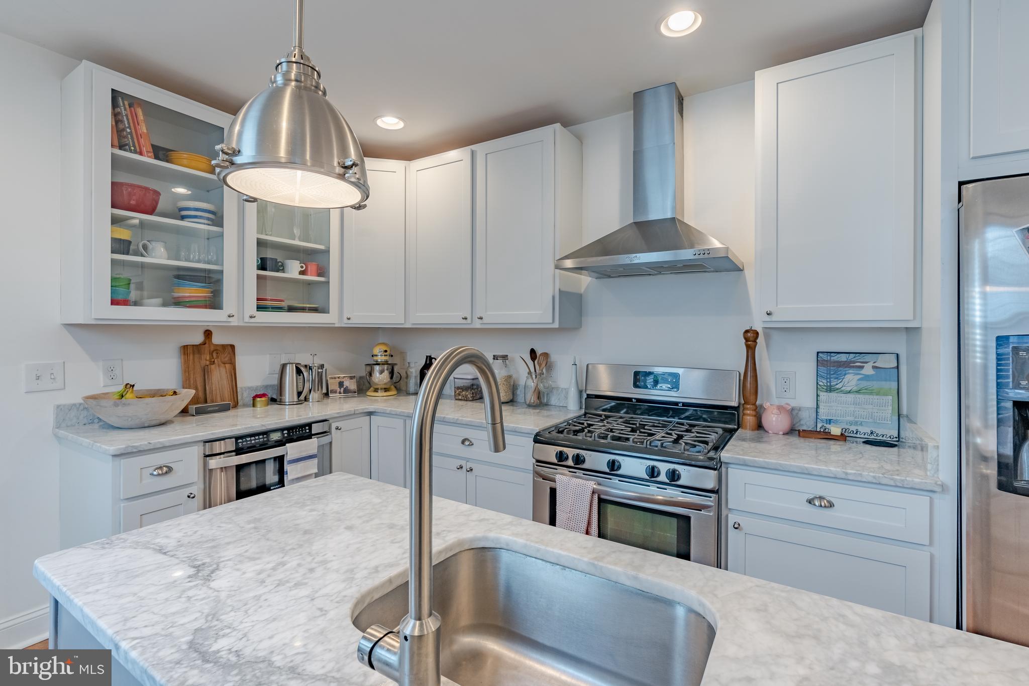 Available June 1st. Stunning renovation with super functional layout, 3 bedrooms above grade with 3 full baths, roof top deck with skyline and water view and 2 CAR PARKING. Gorgeous main  level with coffered ceiling, original curve staircase, shiplap walls and exposed ductwork. Kitchen with marble counters and SS appliances. Master suite with spa - each room with is on bath - walking distance to JHP, Fells Point, Inner Harbor and Patterson Park.  restrictive times -no pets