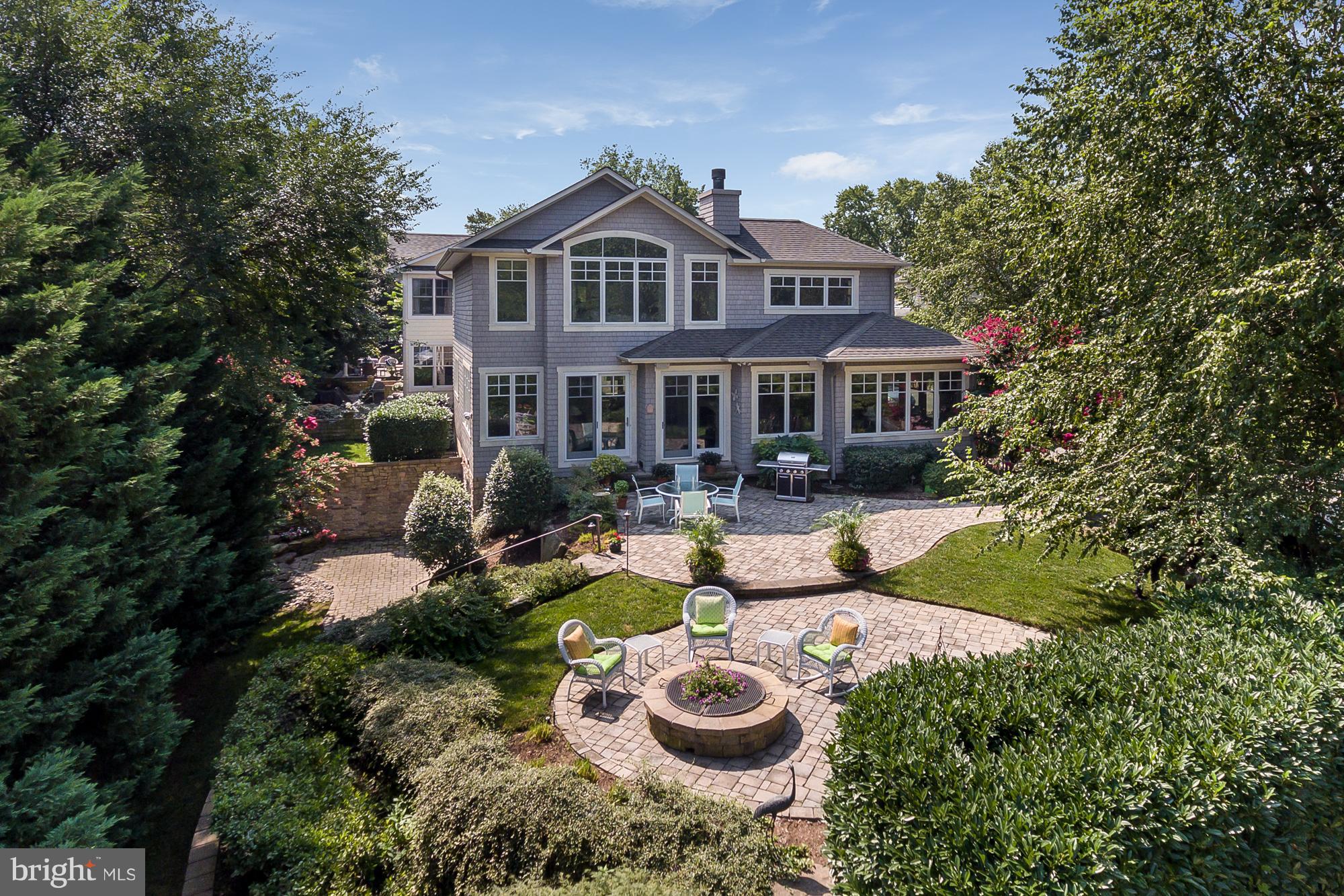 Custom designed & crafted builder's home with open floor plan, water views to historic shoreline. Sep.guest suite has own patio.Walk to Spa Creek Bridge, restaurants, shopping. Lovely private garden and terrace setting, dead end street. Park  3-4 cars. Boat slip rentals, water taxi service & a cup of coffee are just steps away!