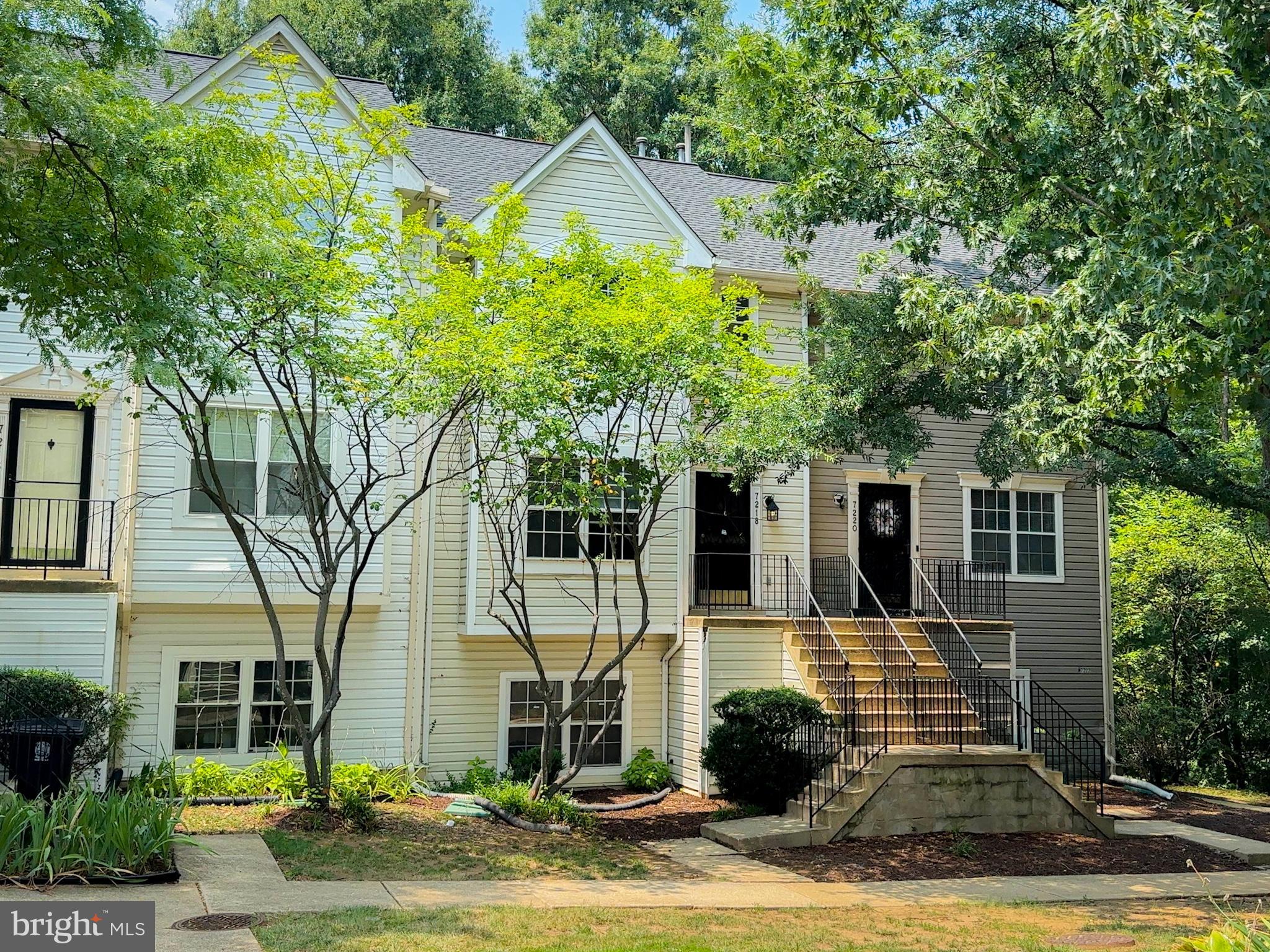 Welcome to 7218 Unit #4! This bright and updated home features a spacious living room, fresh paint throughout, new light fixtures, ceramic tile flooring on the main level, and a refreshed kitchen with new appliances and countertops. Enjoy the deck off the dining area with views of the pond and playground.

The bedroom level offers new PVC flooring, a primary suite with a full bath, two additional bedrooms, a hall bath, and a convenient laundry closet. Additional updates include a newer HVAC system, hot water heater, roof, front and rear security doors, and two reserved parking spaces. Minutes from Metro rail service, I-95/495, and Washington, D.C. Condo fee to confirm