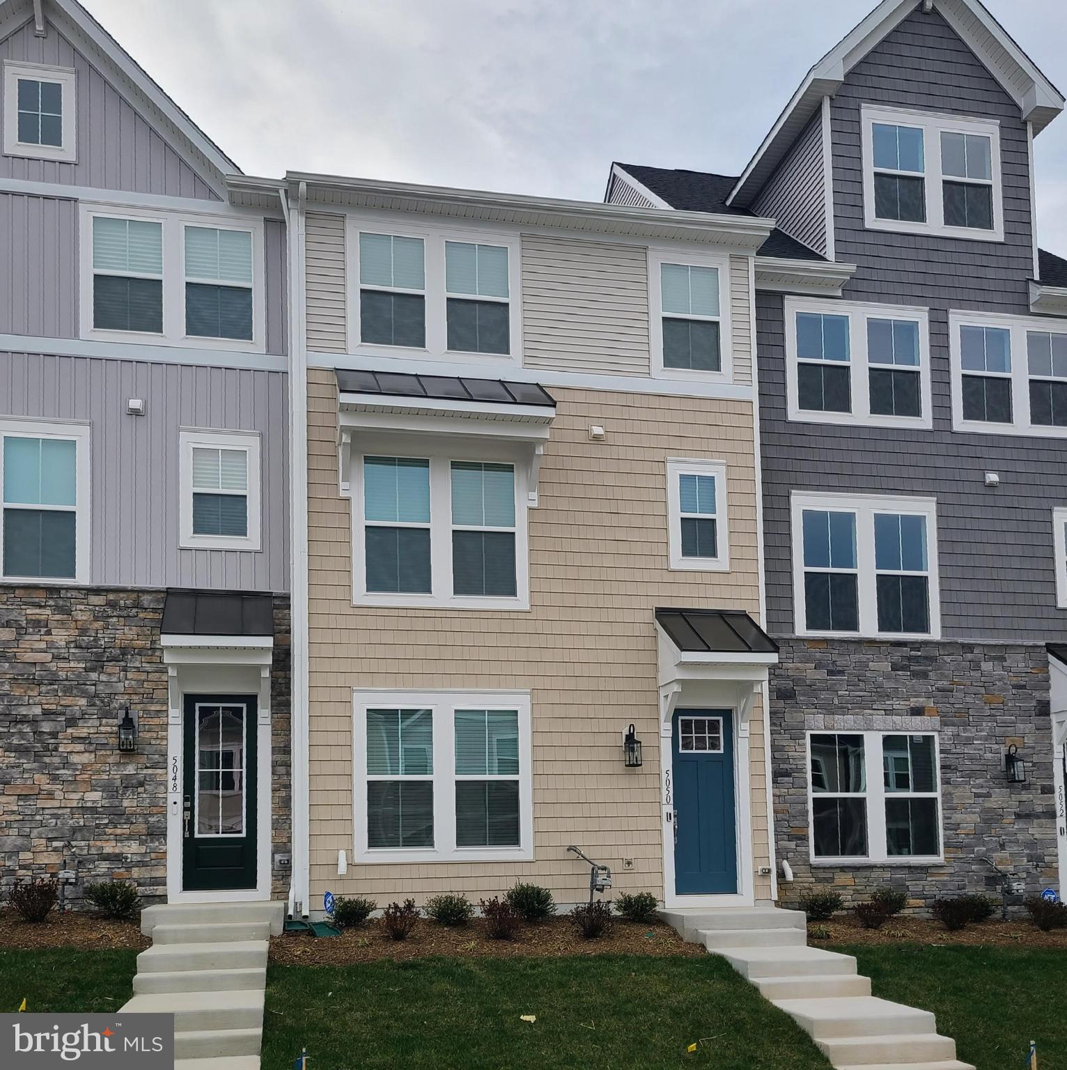 Newly completed in The Grove at Jackson Village, this fabulous 4 BR, 3.5 BA, 3-level townhouse is ready for you to call home.  It features an open great room, gourmet kitchen, and an upper deck.  There is a 1st floor BR with private bathroom, as well as a luxurious primary BR suite on the 3rd floor.  The 2-car garage is rear-entry with additional paved parking spaces, and on-street parking is available in front of the home.  This Spotsylvania County community is convenient to shopping, dining, and commuting options.