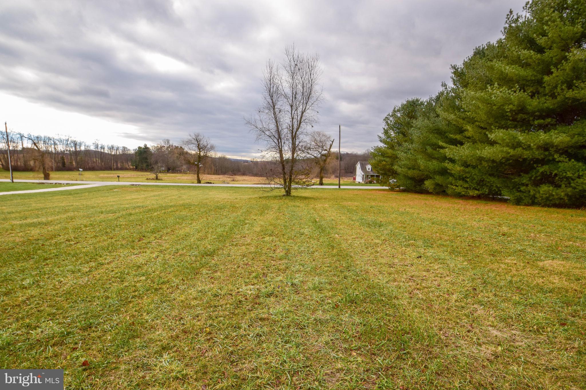 Make the home of your dreams come true on this 1.31 acre, builder-ready Residential lot in peaceful setting just a stone's throw from PA/MD line and the charming town of Lineboro. 150 ft, 30 gpm well on site and recent perk for at-grade septic system.  Tall pines for privacy to one side and lovely rural views!