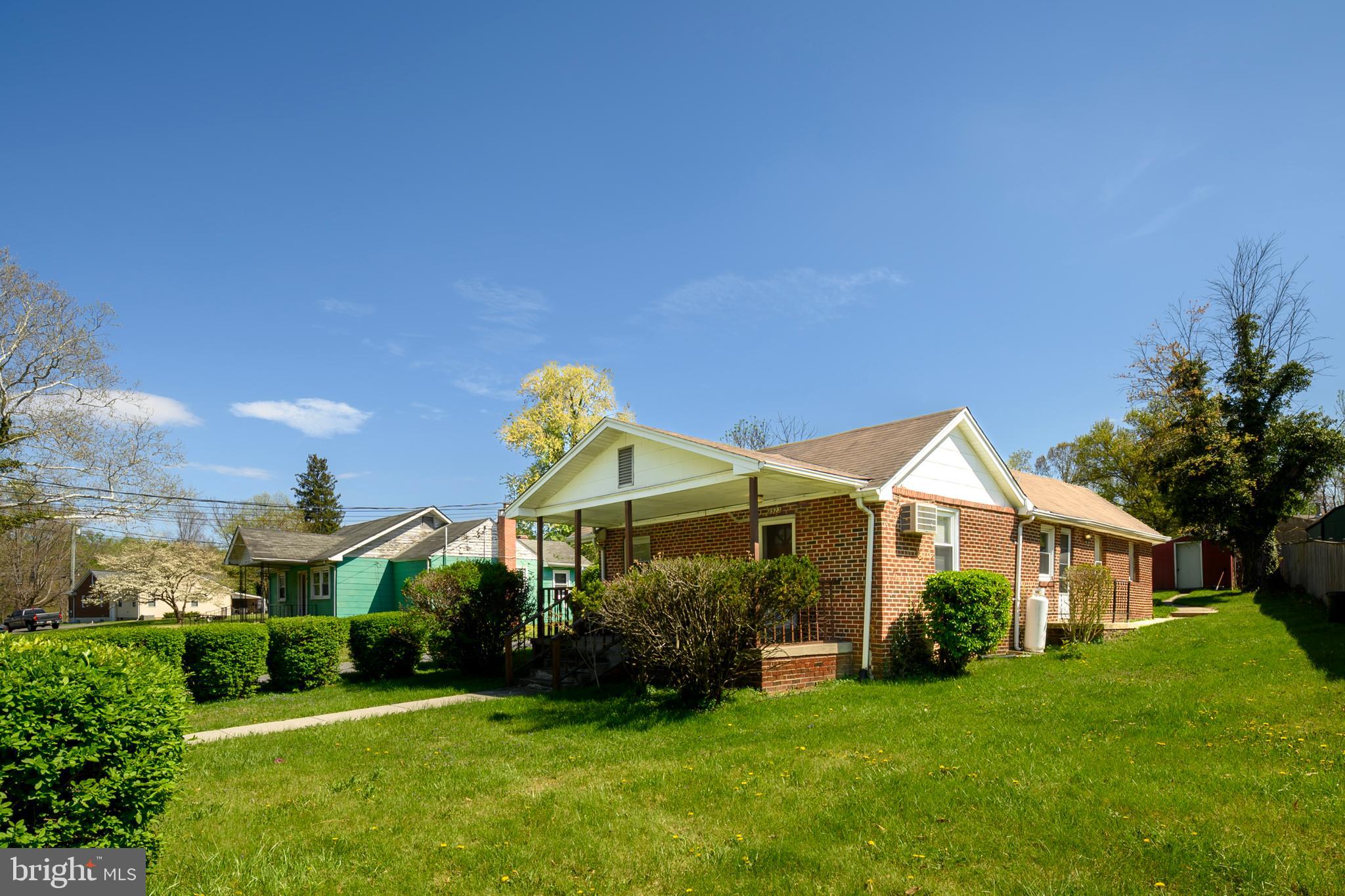 Estate saleNestled in sought after Howard County. Unlimited potential to make this your own oasis. This ranch-style home provides a lifestyle of ease and tranquility. Built in 1948, this residence showcases classic brick construction, offering both durability and timeless appeal. Set on a generous 0.26-acre lot, the property boasts ample outdoor space, perfect for gardening enthusiasts or those who simply enjoy the beauty of nature. The secure storage area provides a practical solution for keeping your outdoor equipment and seasonal items organized, ensuring your outdoor oasis remains clutter-free. Parking is a breeze with a shared driveway accommodating up to four vehicles, complemented by additional off-street parking for guests. The crushed stone driveway adds a touch of rustic charm while ensuring easy access to your home. The backyard offers a blank canvas for your personal touch, whether you envision a tranquil retreat with lush landscaping or an entertaining space for gatherings under the stars. The presence of a shed adds functionality, providing extra storage for tools and outdoor essentials. Inside, the home features three bedrooms and two full bathrooms, providing ample space for relaxation and privacy. The carpet is covering the original hardwood floors. This property is ideally located within five miles of commuter lots, making it a perfect choice for those who value convenience without sacrificing the peace of suburban living. The absence of an association fee allows for greater freedom in how you choose to enjoy your home and property. Embrace the exclusive lifestyle this residence offers, where comfort meets functionality in a picturesque setting. Whether you're looking to create lasting memories or simply unwind after a long day, this home is ready to welcome you with open arms. Experience the perfect blend of classic charm and modern convenience in a space that truly feels like home.