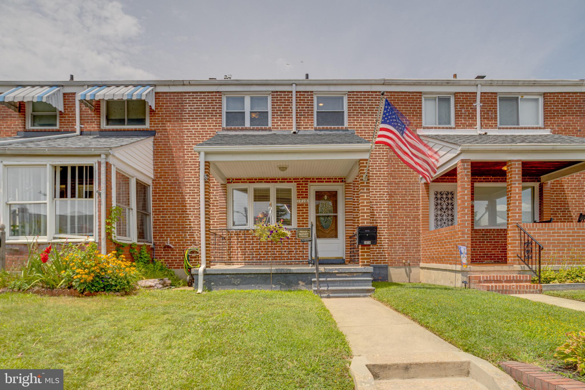 Welcome to this well maintained 3 bed, 2 full bath brick townhome in the Stanbrook community of Dundalk.  Pull out back into the private parking pad or park out front and take the walkway to the large covered concrete front porch.  Entering in brings you to the main level with wood flooring and high ceilings throughout.  You enter into the front living room which opens to a rear dining area that is open concept to the kitchen.  The kitchen has lvp flooring and comes with all appliances.  A rear door off of the kitchen opens out onto a small covered rear porch with a ramp that leads down to the fully fenced rear yard with parking pad.  Taking the stairs up to the upper level brings you to another floor completely covered in wood flooring.  Up here you'll find three bedrooms and a modern full bathroom with a gorgeous tiled walk in shower.  Taking the stairs to the basement brings you to a finished living space with lvp flooring throughout.  Also down here is another modern full bath with a walk in shower, and a semi-finished laundry room with washer/dryer and room for storage as well as access to mechanicals.  This house is well taken care of and is move in ready.  New roof was put on 7/26!  Come see why this should be your new home today!