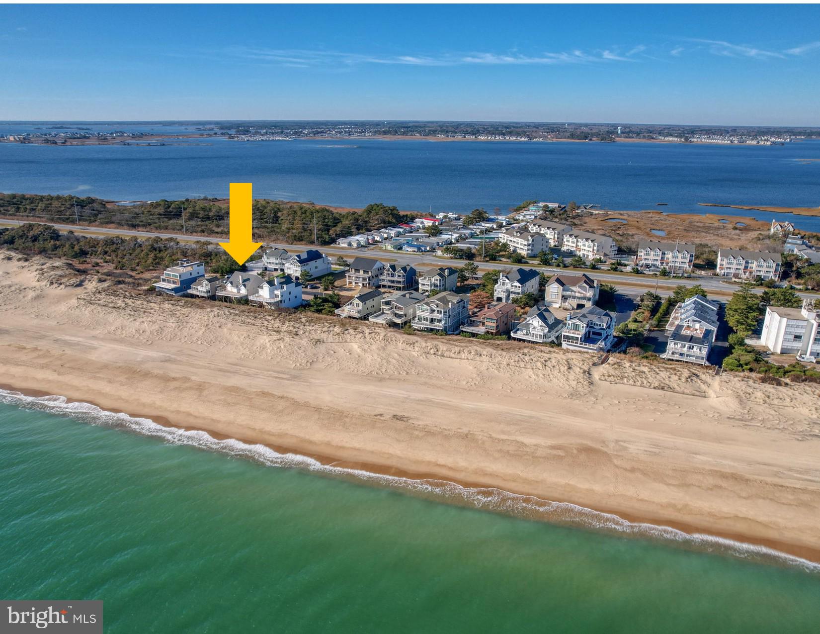 Welcome to Fenwick Acres — an extraordinary oceanfront retreat where every day begins with a breathtaking Atlantic sunrise and ends with a spectacular sunset over the Little Assawoman Bay.
Situated on a rare 60+/- foot-wide oceanfront homesite within the exclusive gated community of Fenwick Acres, this exceptional coastal residence offers sweeping, unobstructed views of both the Atlantic Ocean and Little Assawoman Bay. Bordering Fenwick Island State Park, the property enjoys protected natural vistas, enhanced privacy, and an unmatched sense of tranquility.
Thoughtfully designed for both relaxed coastal living and effortless entertaining, the home offers five bedrooms, four full baths, and one half bath across three spacious levels. The second floor serves as the primary sleeping level, featuring four well-appointed bedrooms and three full bathrooms, including two private ensuite bedrooms and two additional bedrooms connected by a Jack-and-Jill bath. One bedroom also includes a private sauna, creating a peaceful retreat after a day on the beach. A spacious laundry room and generous storage closet complete this level.
The top floor is the heart of the home, showcasing an open-concept living space filled with natural light from expansive windows, glass doors, and skylights. A soaring white pine cathedral ceiling crowns the great room, where a dramatic double-sided wood-burning fireplace creates a warm and inviting gathering space. The updated kitchen features an oversized island and seamlessly connects to the dining and living areas, all opening onto an expansive oceanfront deck designed to capture panoramic water views and coastal breezes.  The owner's suite is located on this level and has access to the oceanfront deck, an ensuite bathroom, and double sided fireplace. 
Additional outdoor living spaces include bay-facing decks on two levels, providing front-row seats to unforgettable sunsets each evening.
Exceptional amenities throughout the home include an elevator servicing all three levels, whirlpool tubs, a Lutron RadioRA lighting system, security system, electric storm shutters, Ring doorbells, generator, EuroCave wine storage, outdoor shower, and more than 600 square feet of enclosed storage, including a separate room ideal for a game room, fitness area, or additional flex space.
The home has been meticulously maintained and thoughtfully updated, with renovations by Beachwood Builders, new heat pumps installed in 2024 and 2025, and numerous additional recent improvements. Beautifully landscaped grounds featuring fountains and accent lighting complement the low-maintenance exterior, while a substantial protective dune enhances both privacy and peace of mind.
This is a truly rare opportunity to own one of Fenwick Island's premier oceanfront properties—where luxury, privacy, and the beauty of the Delaware coast come together in an unforgettable setting. Take the video and 3D tours!