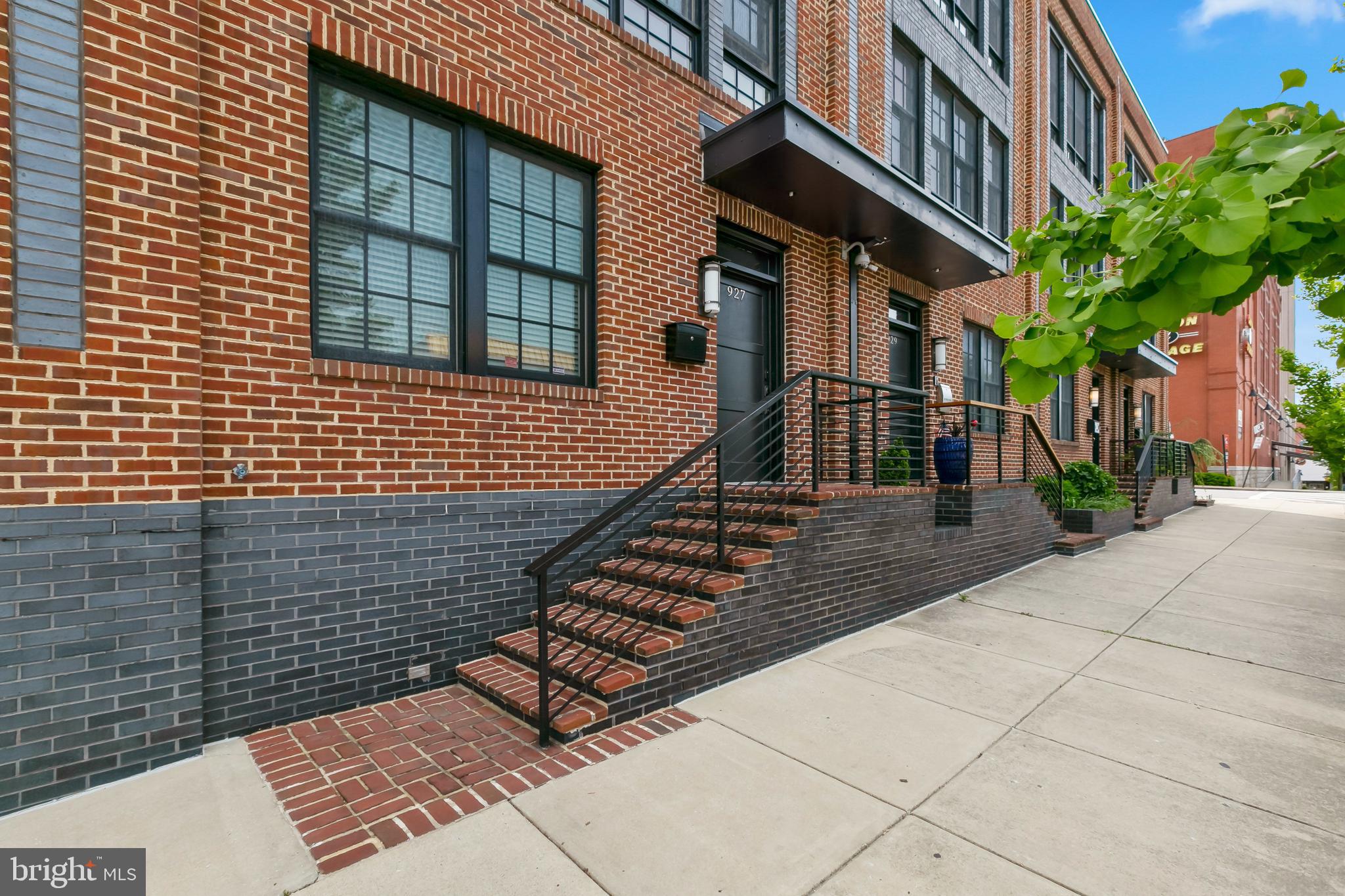 Rare 23' wide end unit with 2 car garage and super easy parking! High end finishes including commercial grade security system and smart home technology.  Open floor plan with Brazilian cherry hardwood, custom stone wall, high ceilings, walk in pantry, walk in closets and much more.   Sweeping city views form the rooftop deck.   The first floor has a large office or bedroom complete with a full bathroom, plus closet and access to 2 car garage.  The second floor is wide open with luxury kitchen and powder room -  you can feel the extraordinary difference in a 23' wide home.  The end unit offers tons of natural light. 2 full suites on the 3rd level with access to stunning well maintained rooftop deck.