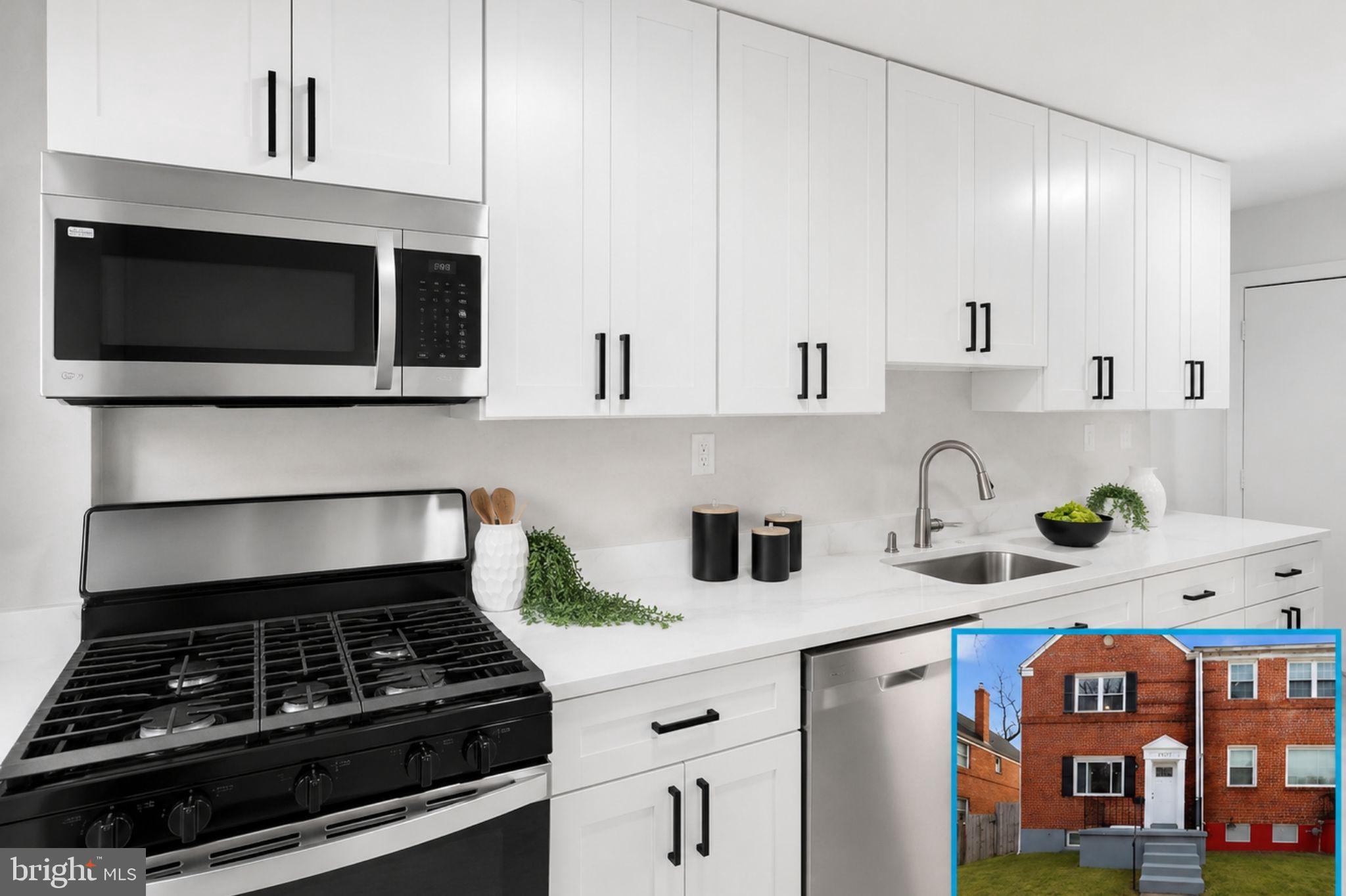 Beautifully renovated end-unit townhome in Edmonson Village! This move-in-ready 3-bedroom, 2-full-bath home offers modern updates and stylish finishes throughout. The updated kitchen features stainless steel appliances—including a gas range, built-in microwave, dishwasher, and refrigerator with ice maker—along with new 36-inch cabinetry, quartz countertops, ceramic tile flooring, and a convenient quartz breakfast bar. A separate dining room provides ample space for everyday meals or entertaining. Upstairs, you’ll find three bedrooms with refinished hardwood flooring, fresh paint, and updated fixtures. Both full bathrooms have been thoughtfully remodeled with custom ceramic tile, new vanities, and modern accessories. The oversized lower-level family room offers the perfect space for relaxing or hosting guests. The rear basement includes a dedicated utility area with washer and dryer, water heater, and gas furnace. Ideally situated in a private setting with plenty of parking, this home faces Gwynn Falls/Leakin Park and offers scenic views and easy access to nature. Conveniently located near shopping, dining, and major commuter routes.