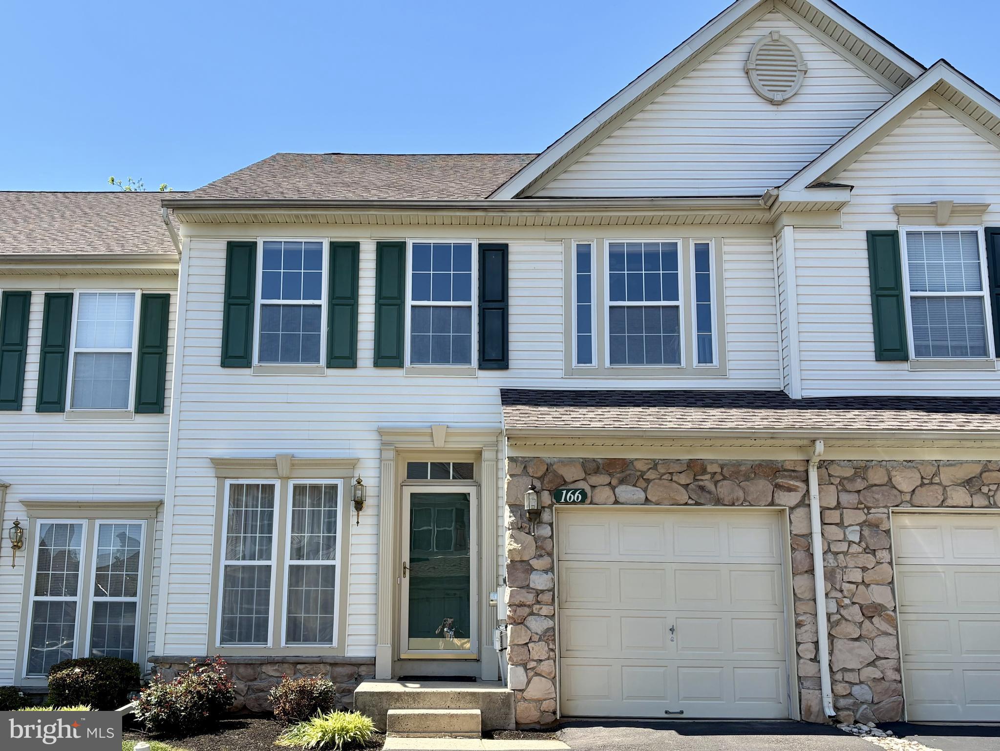 Welcome to 166 Royer Drive in desirable Trappe Borough and the award-winning Perkiomen Valley School District! This beautifully maintained 3-bedroom, 2 full and 2 half bath townhome offers the perfect combination of comfort, style, and convenience.  Step inside to find hardwood floors throughout the main and upper levels. The updated kitchen features modern finishes and opens to a spacious eat-in area with direct access to a large deck—perfect for outdoor dining, entertaining, or simply relaxing with your morning coffee.  The main floor has a family room off the kitchen and a combined LR/DR with lots of natural light, a half bath completes the main floor.  Upstairs, you'll appreciate the convenience of second-floor laundry along with a spacious primary suite with a walk-in closet and master bath.  Also on the scond floor are two additional bedrooms and a hall bathroom.  The finished basement provides valuable extra living space, complete with a half bath and plenty of storage space as well.  The basement is ideal for a family room, home office, gym, or playroom.  Additional highlights include a one-car garage, new HVAC system (2022), and new hot water heater (2024), offering peace of mind for years to come.  Conveniently located near shopping, dining, parks, and major commuter routes, this move-in ready home is one you won't want to miss!