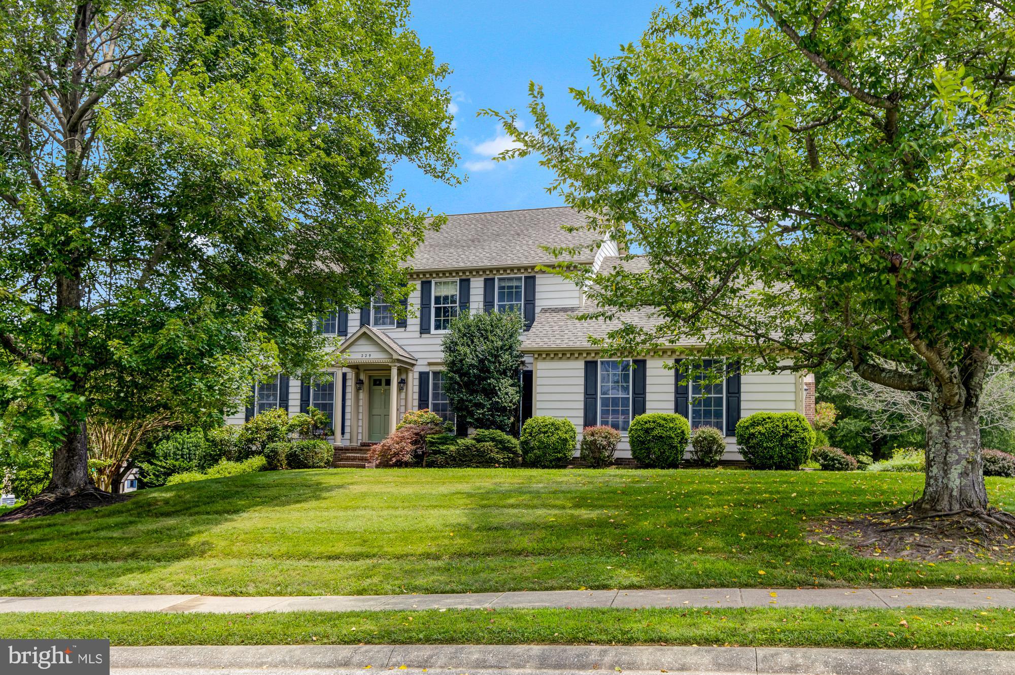 Welcome to this beautifully maintained 4-bedroom colonial nestled in the highly desirable Parsons Ridge community. Featuring 2 full and 2 half baths, this home offers the perfect blend of classic charm and modern updates across three spacious levels.

Step inside to find gleaming hardwood floors throughout the main level, including a private first-floor office—ideal for today’s remote work needs. The spacious living and dining rooms are enhanced by elegant crown molding and wainscoting, creating a warm and inviting atmosphere for gatherings and holidays.

The updated kitchen is a chef’s delight, showcasing granite countertops, stainless steel appliances, and a peninsula with seating that opens seamlessly to the large family room. This inviting space features custom built-ins, a cozy gas fireplace, and a patio door that leads to a deck overlooking one of the best lots in the neighborhood—flat, private, and perfect for outdoor entertaining or play.

Upstairs, the generous primary suite includes a walk-in closet and an en suite bath with a double vanity, sunken tub, and separate stand-up shower. Three additional well-sized bedrooms and a full hall bath complete the upper level.

The finished lower level provides even more living space with a large rec room, half bath, additional built-ins, and ample storage. A two-car garage rounds out this exceptional property.

Don’t miss the opportunity to own this stunning home in a peaceful and established neighborhood just minutes from shopping, dining, and commuter routes.
