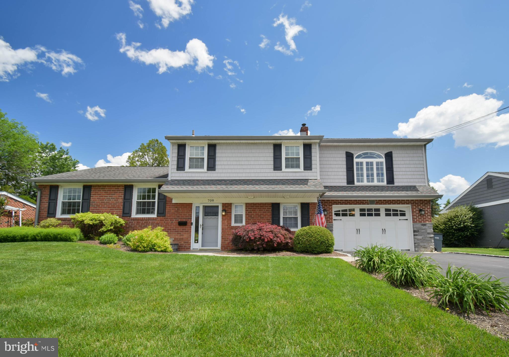 Welcome to this stunning, move-in-ready split-level 5 Bedroom 3 full bath home in the community of Dutton Mill. The moment you arrive, you will be captivated by the pristine curb appeal, manicured lawn and oversized attached garage. As you step through the main door, revealing an inviting family room with rich hardwood floors and striking built-in bookcases. The first floor family room also gives you the option of an additional bedroom with completed full bath. Up the elegant hardwood stairs that guide you to the warm, open-concept living area featuring a beautiful fireplace, gleaming floors, recess lighting and crown molding. The Living room flows effortlessly into the dining area which is sunny and bright and overlooks the gourmet kitchen. The kitchen boasts cream cabinetry, speckled granite countertops, backsplash, a large farmhouse sink, a complete suite of stainless steel appliances, and gleaming wood floors. 

Off the kitchen and spacious dining area features direct access to the outdoor deck. The trex deck provides a perfect spot for entertaining. The upstairs host 4 bedrooms and two full baths including the serene primary suite, featuring a stunning arched window and a dedicated walk-in closet with ample shelving. The spa-inspired bathroom features a luxurious glass-enclosed walk-in shower, an elegant double vanity with stone countertops. The exterior back is truly exquisite. Follow the charming paver walkway that guides you alongside a lush, expansive green lawn bordered by mature trees and dense privacy hedges. The large flat back also features  an additional shed and play area. Located within the highly sought-after Penn-Delco School District in Delaware County, this stunning property will not last long!