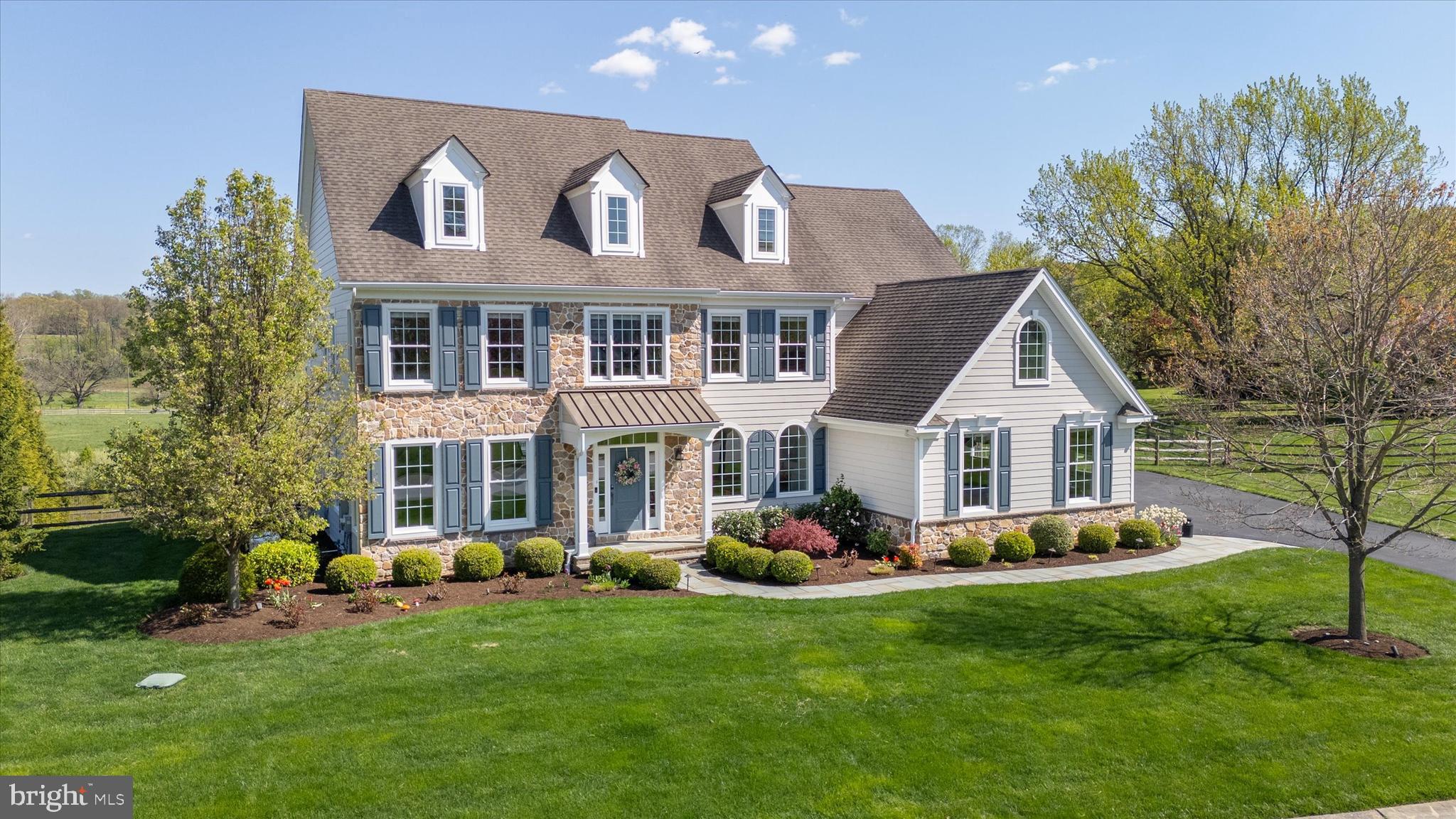 Introducing 300 Laurali Drive, a charming residence nestled within the highly regarded Unionville-Chadds Ford School District. Situated within the desirable Glenelg Farm neighborhood, this home offers serene views of Pocopson Creek, embodying the essence of sophisticated living.

 Approach the residence via a Pennsylvania Bluestone walkway, leading guests to the inviting covered front porch. Inside, the home’s elegance unfolds with gleaming hardwood floors and an abundance of natural light throughout this true center hall colonial design.

 Flanking the foyer, the expansive formal dining and living rooms set the tone for refined living. A private den, set off from the main hub of the home, is bathed in sunlight and offers panoramic views of the creek and nature preserve. An adjacent powder room adds convenience for the work-from-home professional.

 
The heart of the home lies in the gourmet kitchen, boasting timeless cherry cabinetry, premium stainless-steel appliances, granite countertops, and a statement center island. A sunlit breakfast room provides a picturesque setting for morning coffee. The adjacent family room, adorned with a cozy fireplace and custom built cabinetry, offers a warm retreat. Completing this level, a convenient second powder room, ample closet space, and a spacious three-car garage enhance daily living. Step outside to a sprawling maintenance-free deck, ideal for entertaining family and friends.

 Ascend the half-turn staircase to discover an upper level including the sumptuous master suite, complete with an expansive closet and a spa-like bath featuring a soaking tub, frameless shower, updated dual vanities and dressing table, and private water closet. Three additional bedrooms provide comfort and privacy. A princess suite includes a walk-in closet and private bath with marble tile. Two additional bedrooms share a Jack-and-Jill bath, also with marble tile. A dedicated second-floor laundry adds convenience.

 Descend to the finished basement, where guests will find a full bath, bonus room, and a sunlit walkout to a private patio including fire feature. The expansive living area features a bar that is perfect for entertaining, and abundant storage. Step out the sunny walkout onto the Pennsylvania Bluestone patio. Mature foliage graces the fully fenced backyard, offering tranquility and privacy.

This meticulously maintained home boasts new carpeting throughout. The septic system was recently inspected and certified, ensuring peace of mind. Just minutes from Longwood Gardens, downtown Kennett Square, and local public schools, this home offers the solitude of the country with accessibility to all that the area has to offer.