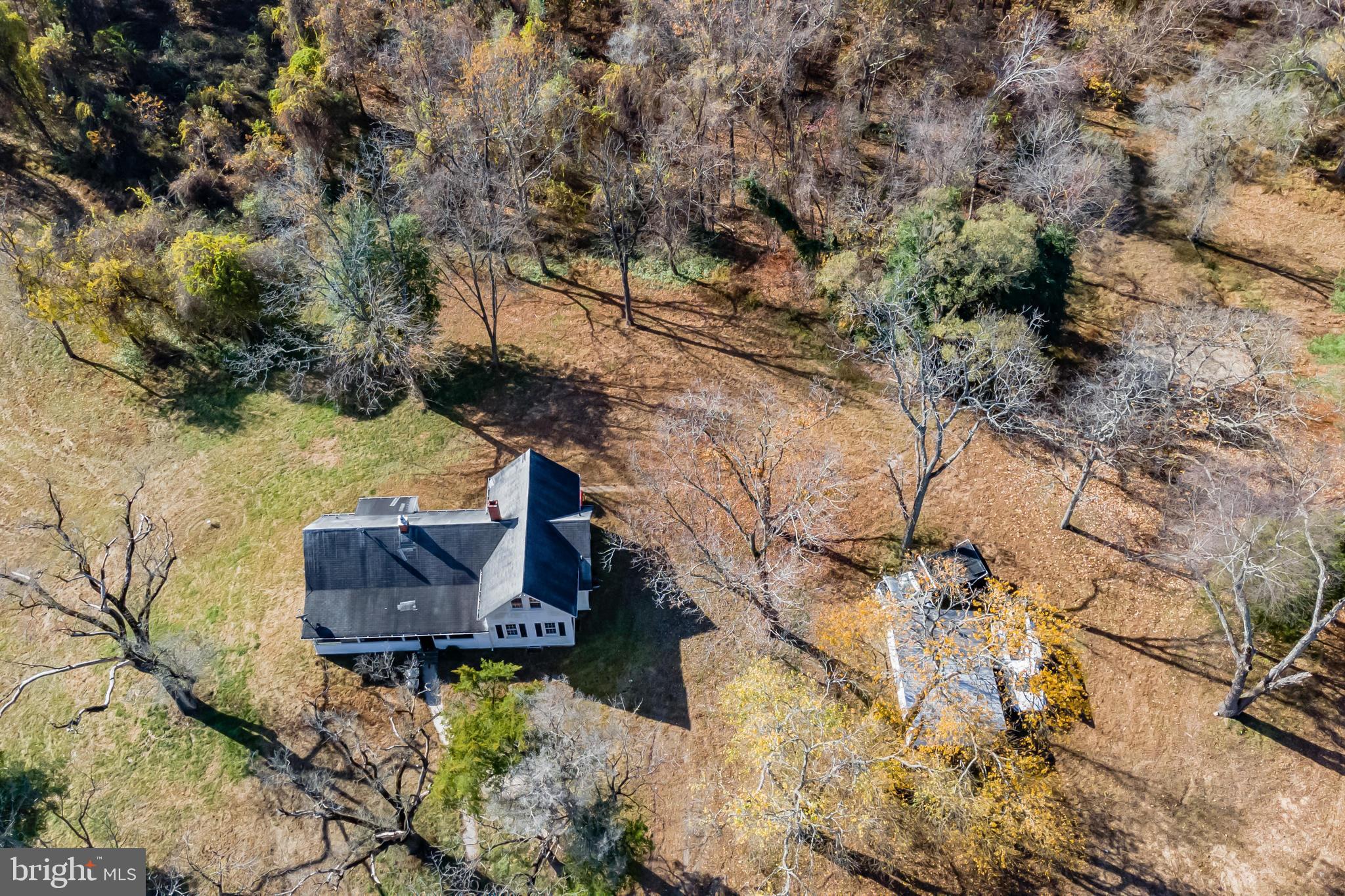 Original 1930's farmhouse located on 83+ acres in Davidsonville!  The home features 4 total bedrooms and 2 full bathrooms, plus wood flooring and a cozy, wood-burning fireplace!  This property is located just minutes from Route 50 and a short drive to Annapolis & Baltimore!