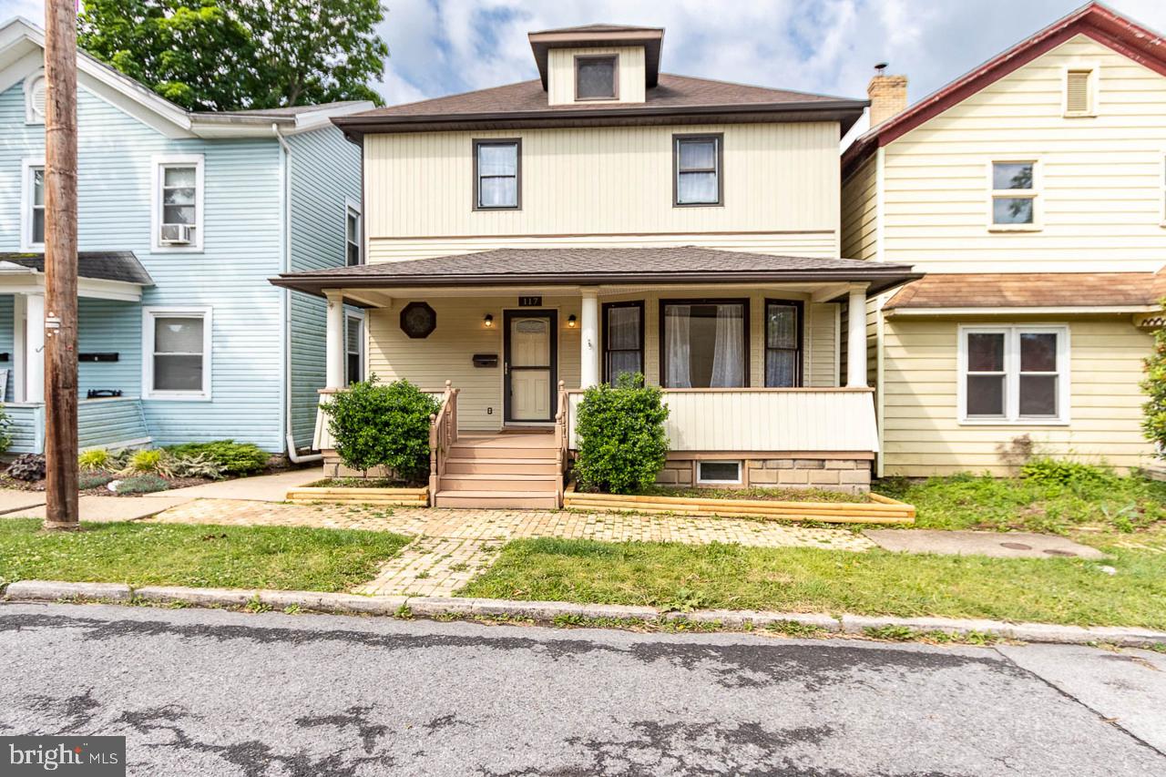 Step into timeless charm and character in this inviting 4-bedroom, 1.5-bath home filled with beautiful oak woodwork, rich hardwood floors, and the warmth that only a classic home can offer.  From the moment you enter the welcoming foyer, you'll feel right at home. The light-filled living room features a large bay window that creates the perfect spot for your favorite plants, a cozy reading nook, or simply enjoying the natural sunlight. The adjoining dining room showcases stunning built-in shelving and offers an ideal setting for family dinners, holiday celebrations, and making memories for years to come.  The functional kitchen provides an abundance of oak cabinetry, offering plenty of storage and workspace, while a convenient half bath completes the main level.  Upstairs, you'll find four bedrooms, including a smaller room that could easily serve as a home office, nursery, walk-in closet, or additional bedroom depending on your needs. A full bath serves the second floor, and the walk-up attic presents exciting potential for future finished living space.

A newer furnace provides peace of mind during the colder months, while the heated garage offers endless possibilities, whether you're parking vehicles, storing recreational toys, creating a workshop, or pursuing your favorite hobbies.  Outside, the cozy backyard is the perfect place to create your own private retreat. Add a small garden, outdoor seating, or transform the space into a charming courtyard oasis.

If you've been searching for a home that combines character, functionality, and room to grow, this could be the one. Come take a look and start planning your move to your next address.