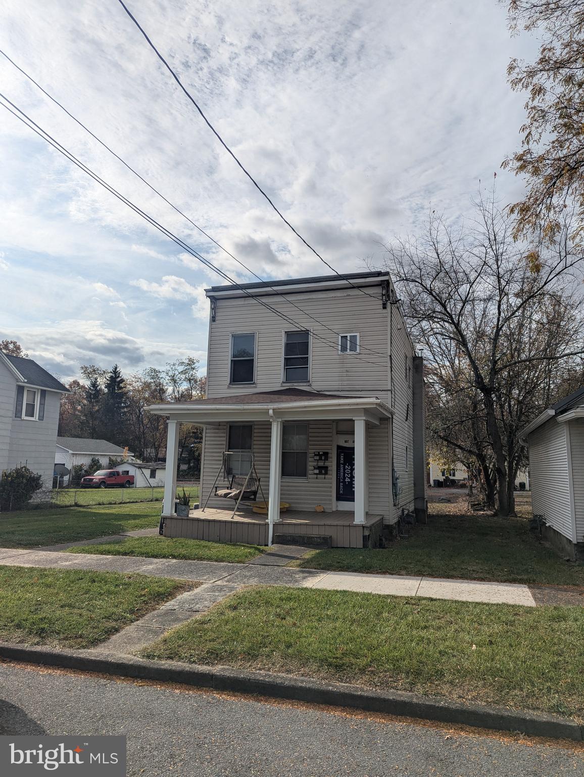 Great Income producing duplex. Long term tenant in Apt. 1 at $530 a month. Apt. 2 is $750. Large 2 bay garage is being used as storage at $125 a month.  ( Income is $1450 a month). Tenants pay electric. Owner pays gas for Apt. #1 and the water for both units. Some renovations were made on Apt. 2.