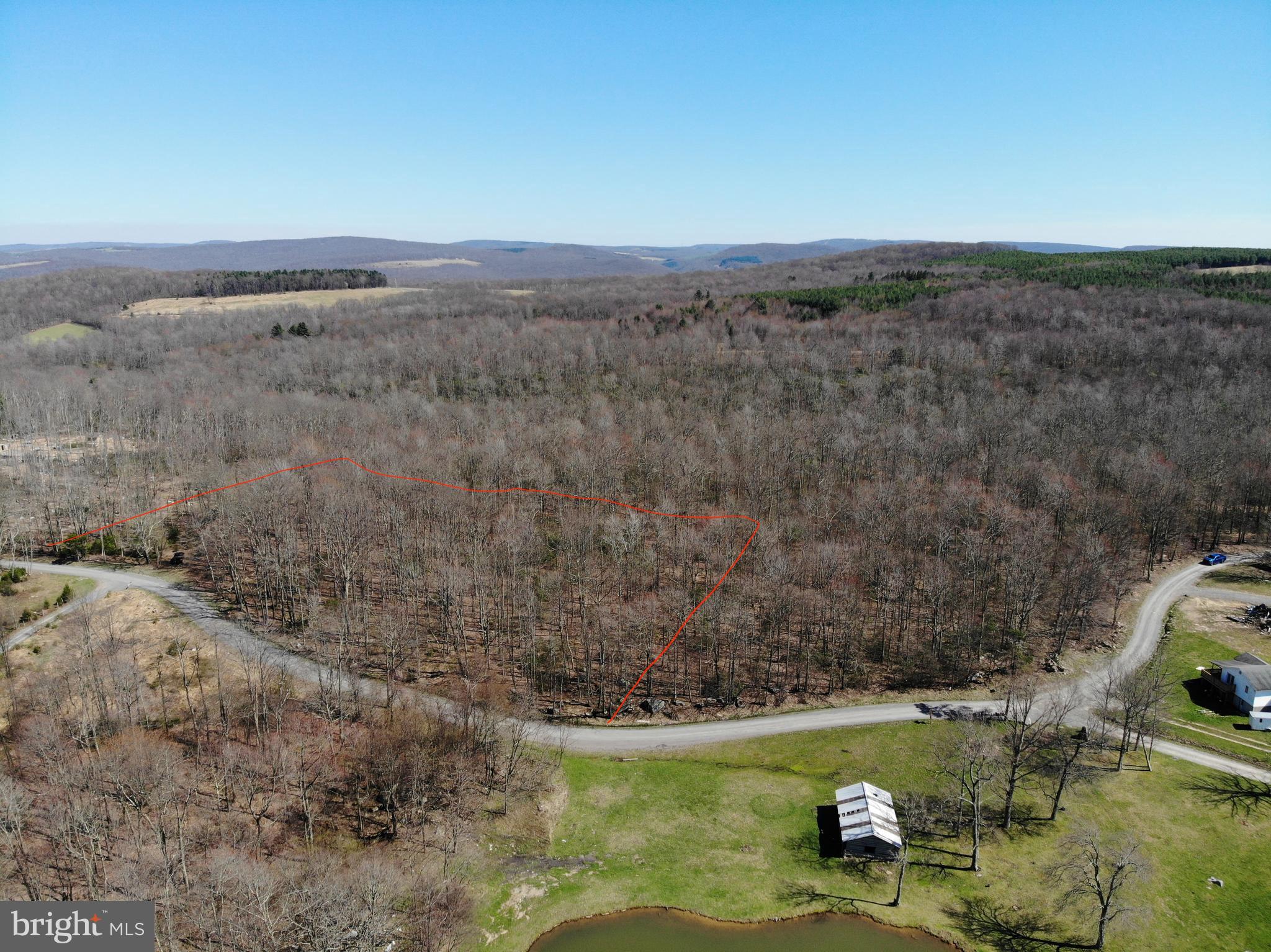 Welcome to this little slice of heaven ... literally, this 3.7 acre +/- wooded lot located in Friendsville bordering West Virginia is an absolute beautiful piece of land. The property has great road frontage, is level throughout, and greets you with a lovely hardwood forest mixed with evergreens and rhododendrons. This land is perfect for any outdoor recreational activity including hunting, camping, hiking, or just make it the perfect mountain retreat. Property had a perc test on it, but it is since expired so new testing would probably be required. Imagine building your dream home with mountain views, and just a quick trip down to Deep Creek Lake. So many opportunities come with this land, you would think it's much bigger. With no zoning restrictions, Dream big on a smaller budget with this one, schedule your private tour today!