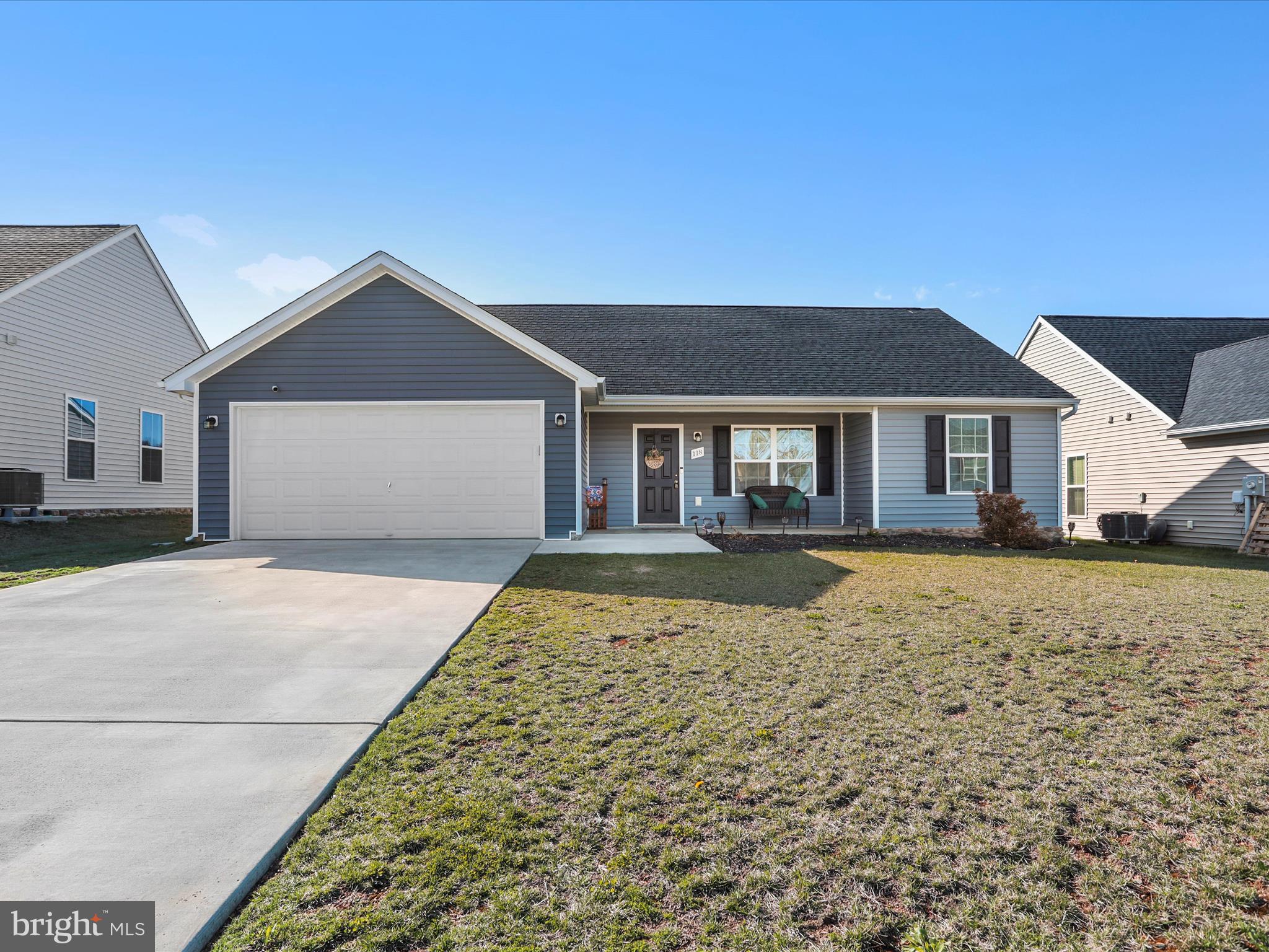 Your Ideal Home Awaits at 118 Peking Lane, Martinsburg, WV! 
Discover the charm and comfort of this stunning property! This Beauty offers 3 Bedrooms, 2 baths, primary bedroom offers ensuite with walk-in tile shower and walk-in closet. Open floor plan w/ vaulted ceilings, Kitchen w/ island and granite countertops, laminate vinyl flooring, hp/cac, concrete patio, and 2 car garage. Don't miss the chance to own this beauty! Call today!