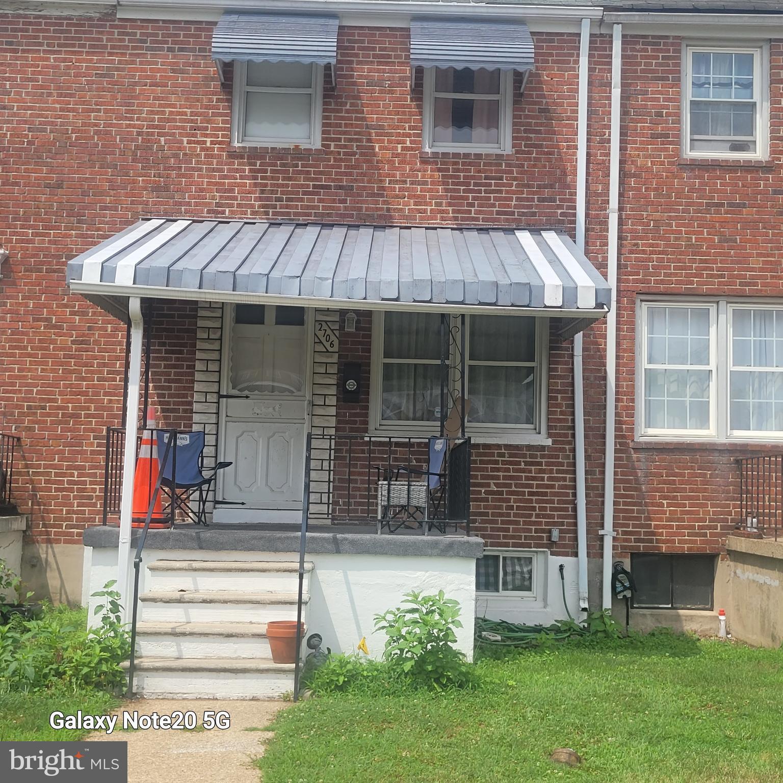 Solid brick townhome  2 Bedrooms/1 Bath/ Updated Kitchen w New Cabinets/Quartz Counter tops and a new stove, Breakfast Bar between the kitchen and Dining Room. laminate flooring, Front and Back Covered Porches, fenched yard, partially finished basement, could be an extra bedroom or a rec room.
 In need of some TLC - Sold Strictly "AS IS".  Seller not in a position to make any repairs. Reasonable Offers Only.