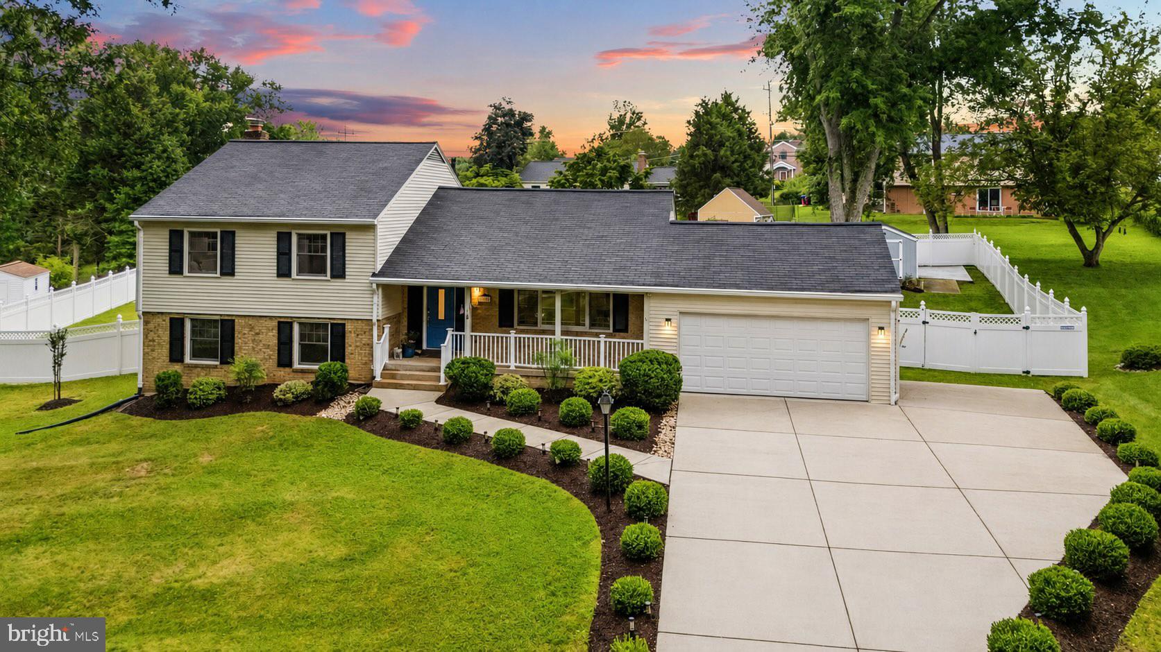 Move-in ready and beautifully updated, this exceptional 5-bedroom, 3-bathroom split-level home in the highly sought-after Needwood Estates offers the perfect blend of style, comfort, and convenience. Nestled on a private 0.45-acre lot, this home features a thoughtfully designed living space, a 2-car garage, a charming front porch, and an incredible, fully fenced backyard designed for everyday living and entertaining.

The heart of the home is the fully renovated kitchen, featuring elegant quartz countertops, a center island, stainless steel appliances, and custom 46-inch cabinetry that provides abundant storage and a timeless, upscale look. The open layout flows seamlessly into the dining and living areas, creating an inviting space for gatherings large and small. Hardwood floors, luxury vinyl plank flooring, and a classic brick fireplace downstairs add warmth and character throughout.

Five spacious bedrooms and three bathrooms offer room for everyone, while the flexible lower level is ideal for a recreation room, home office, gym, or guest suite.

Step outside to your own private backyard retreat. The expansive, fully fenced yard offers plenty of space to relax, entertain, garden, or play. A unique commercial-grade playground safety surface creates the perfect play area, while the large storage shed provides ample space for lawn equipment, bikes, and seasonal storage.

Ideally located in the heart of Needwood Estates, this home is just minutes from Needwood Golf Course, Lake Needwood, Rock Creek Regional Park, Shady Grove Metro, ICC (MD-200), and I-270, with convenient access to shopping, dining, and all the amenities of Rockville and Derwood. Whether you are commuting to Washington, D.C., enjoying a round of golf, exploring miles of scenic hiking and biking trails, or spending the day on the lake, you will love the exceptional lifestyle and convenience this location has to offer.

If you have been searching for a move-in-ready home with a renovated kitchen, quartz countertops, custom 46-inch cabinets, updated bathrooms, a front porch, a 2-car garage, a large fenced backyard, and an unbeatable location in Needwood Estates, this is the one you have been waiting for.