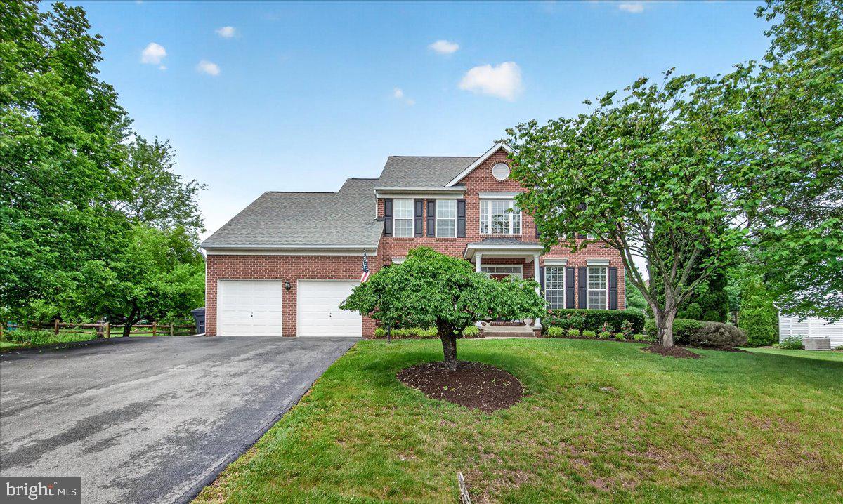 Welcome home to this stunning brick-front Colonial nestled on a spacious lot in the desirable Clover Hill III community. Featuring 4 bedrooms, 3.5 baths, a private home office, formal living and dining rooms, and a fully finished lower level, this home offers over three levels of versatile living space. The bright and open layout is perfect for both everyday living and entertaining, while the finished basement provides additional recreation space, a full bath, potential guest accommodations, and abundant storage. Generously sized bedrooms, beautiful outdoor living areas, a 2-car garage, and an extended driveway complete the package. Step outside to enjoy the expansive backyard, mature landscaping, deck, and patio, creating the perfect setting for summer gatherings and peaceful evenings at home. Located in one of Frederick's most popular communities, residents enjoy pools, basketball courts, baseball fields, playgrounds, and scenic walking trails. Just 10 minutes from vibrant downtown Frederick and major commuter routes, this exceptional home combines space, convenience, and community, all with NO CITY TAXES.