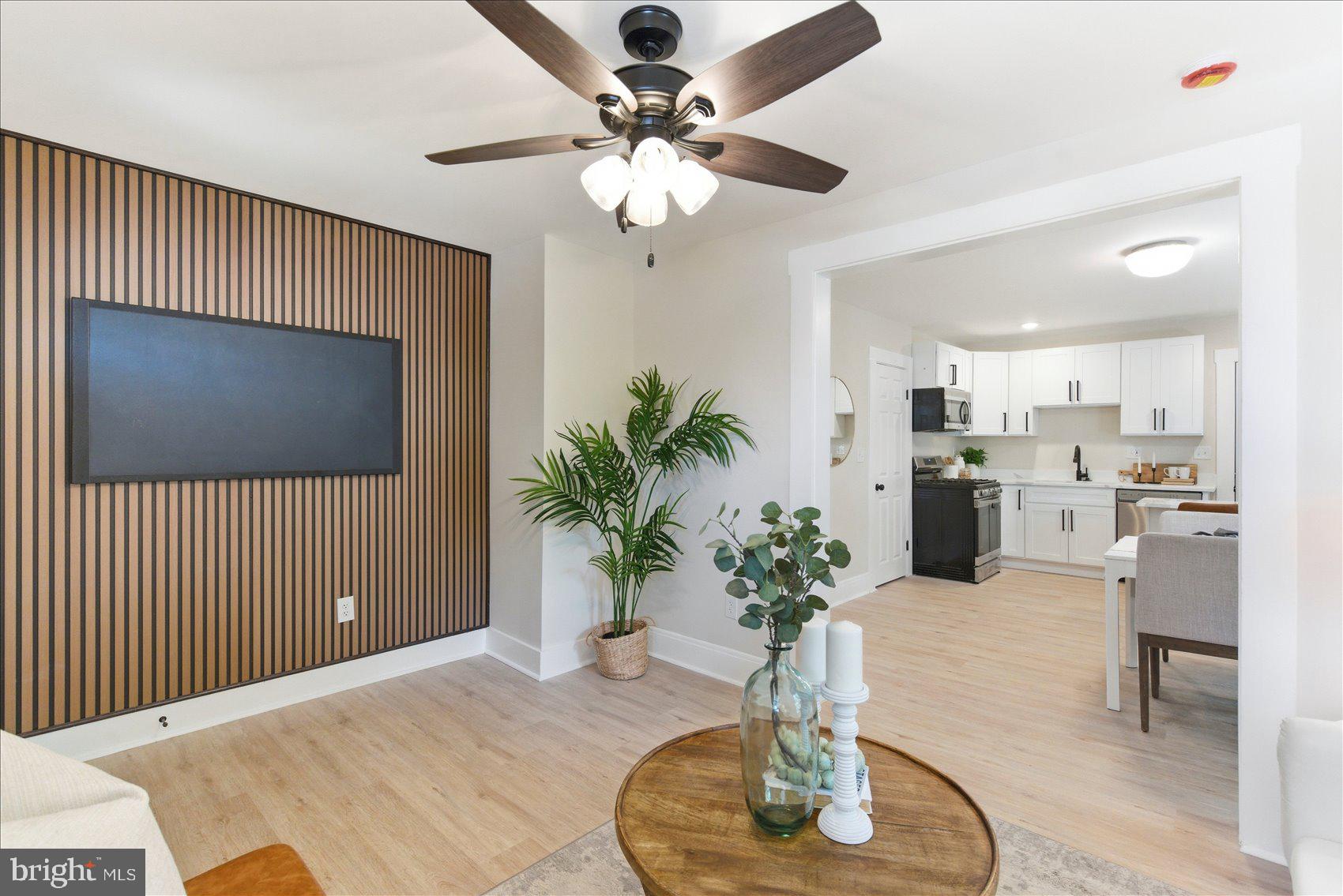 Beautifully renovated 4-bedroom, 2-bath Cape Cod nestled in the heart of Catonsville. A charming covered front porch welcomes you into a sun-drenched, open-concept interior featuring luxury vinyl plank flooring throughout the main living areas and an abundance of windows that fill the home with natural light.

The thoughtfully designed kitchen is the centerpiece of the home, complete with sleek quartz countertops, stainless steel appliances, a convenient breakfast bar, and generous cabinetry—ideal for both everyday living and stylish entertaining.

The main level offers two spacious bedrooms with brand-new plush carpeting and a fully updated, modern bath. Upstairs, retreat to an expansive primary suite featuring ample room for a sitting area, an oversized walk-in closet/dressing room, and a beautifully appointed ensuite bath with contemporary finishes.

The finished lower level provides additional versatile living space with new carpeting—perfect for a media room, home office,  guest area or possible bedroom —adding valuable square footage to the home. 

Enjoy outdoor living in the fully fenced backyard, ideal for gatherings, pets, or quiet relaxation. This move-in-ready home blends modern updates with timeless charm in a highly desirable location.