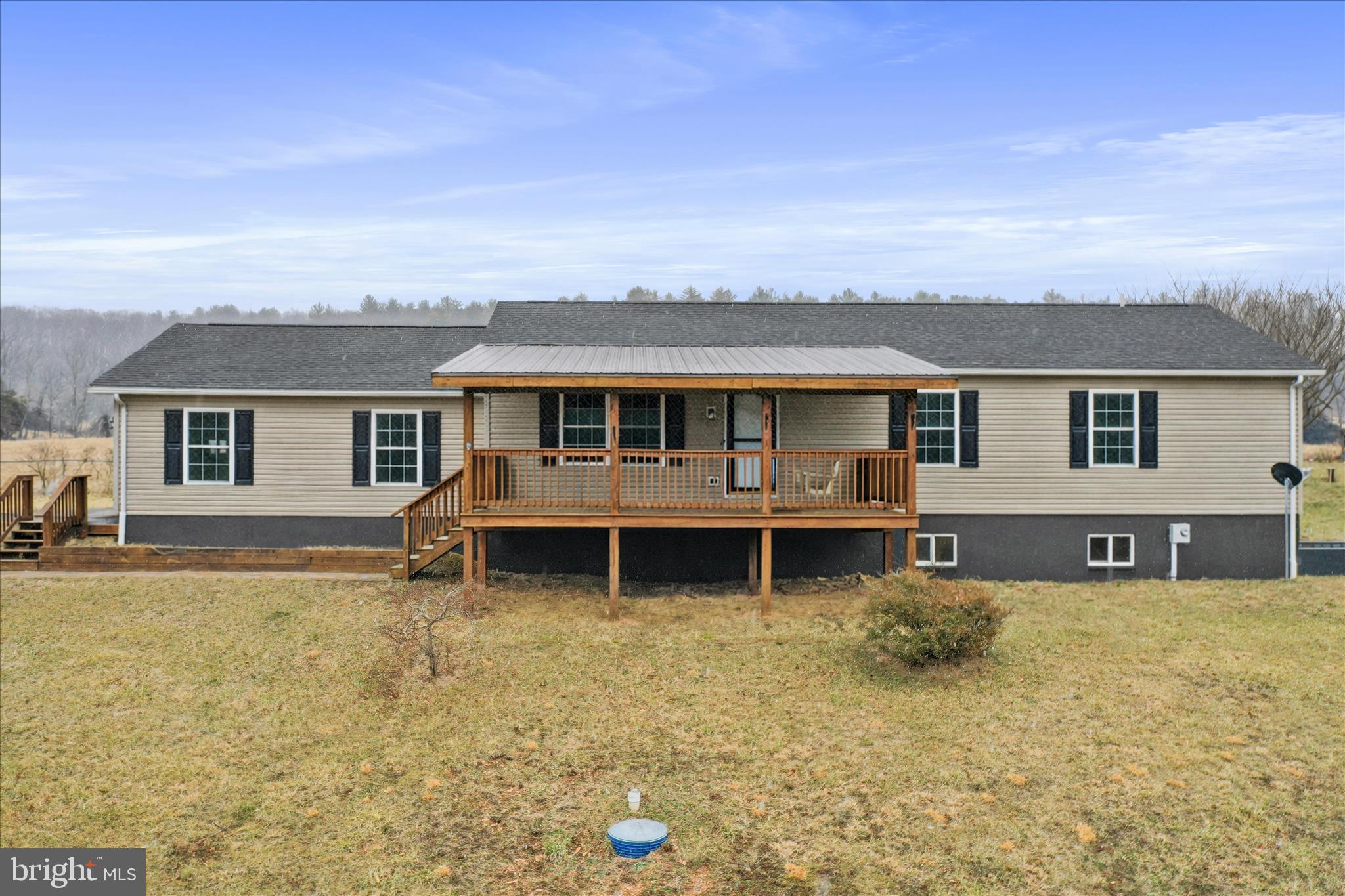 Welcome home to this beautifully renewed 3-bedroom, 2-bath rancher nestled on 1.5 peaceful acres. Perfect for one-level living, this thoughtfully refreshed home offers comfort, style, and convenience all on the main floor.

Step inside to discover all new flooring and modern lighting fixtures that create a bright, welcoming atmosphere throughout. The kitchen shines with granite countertops, stainless steel appliances, and ample cabinet space—ideal for both everyday living and entertaining. The washer and dryer are conveniently located on the first floor, making daily living even more functional and efficient.

Enjoy peace of mind with a brand new roof and the ease of true main-level living. The full unfinished basement provides incredible potential—ready to be transformed into additional living space, a home gym, recreation room, or in-law suite to fit your needs.

Outside, you’ll love the fully fenced yard, perfect for pets or play, and the inviting front porch where you can relax on a swing and take in the quiet surroundings.

With fresh updates, room to grow, and space to breathe, this property offers the best of comfortable country-style living while still being convenient to everyday amenities. Don’t miss the opportunity to make it yours!

Agent is Seller