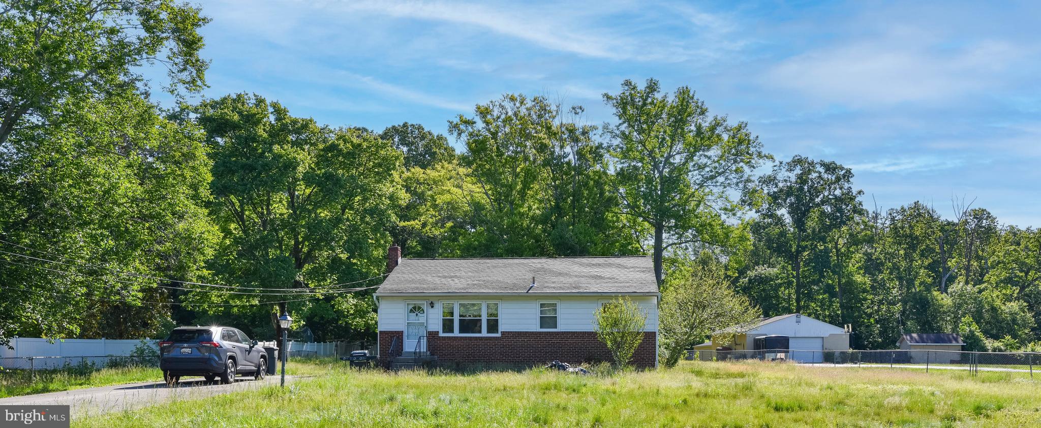 OPEN HOUSE MONDAY, JUNE 1, 2026 FROM 9:30 AM - 10:30 AM
List Price is Opening Bid.  Online Auction Only! Bidding begins Saturday, May 30th, and ends Thursday, June 4, 2026 at 12:00 PM. This single-family detached rancher offers comfortable one-level living with additional space in the partially finished walk-out basement. Situated on approximately 0.889 acres per SDAT, the property offers expansive outdoor space with large front and rear yards. The home is in need of updating and some renovation, presenting an excellent opportunity for an owner-occupant to customize the home or for an investor seeking a potential flip opportunity. Conveniently located in the southern portion of Prince George’s County, the property provides easy access to major commuter routes including MD-5 (Branch Avenue) and US-301.

Main Level Features
• Living room 
• Galley kitchen with tile flooring and direct access to the rear deck and fenced backyard
• Three bedrooms with wood type flooring
• One full bathroom

Lower Level
• Full Unfinished Basement with access to rear yard.
• Potential for Bonus room(s) 
• Designated Laundry & Storage areas
• Forced hot air heating system (Oil Heat)
• Electric water heater
• 100-amp electrical service
• sump pumps
• A/C fan and electric meter installed

Exterior Features
• Large fenced front and rear yards
• Private driveway allows for parking
• Rear deck and storage shed

Location Highlights
Convenient Brandywine location near shopping, dining, and commuter routes. Outdoor recreation nearby includes Cedarville State Forest, Cosca Regional Park, Piscataway Park, and Rosaryville State Park offering hiking, biking, playgrounds, picnic areas, and scenic trails. Nearby wineries include Robin Hill Farm & Vineyards, Romano Vineyard and Winery, and Janemark Winery & Vineyard.

Note: Property is served by public water and a private septic system. 
Seller has no information regarding the septic system including its age, condition, service history (if any), etc. The information contained herein was obtained from sources deemed to be reliable, but is offered for informational purposes only. Neither the auctioneer or the owner make any representations or warranties with respect to the accuracy of information.