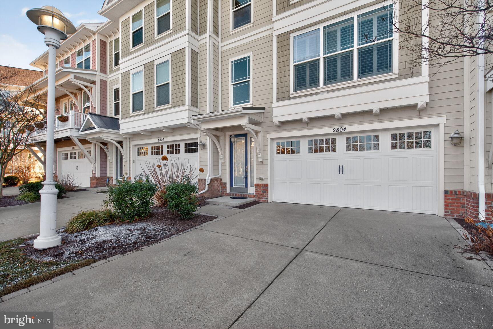 Spacious three-level Rivermarsh townhouse offering significantly more finished living space than most new construction options in the community, with the added benefit of immediate availability. Located adjacent to the Hyatt Regency Chesapeake Bay Resort, this home delivers a coastal, resort-style lifestyle without the wait, uncertainty, or upgrade costs often associated with new builds.
The main level features an open-concept layout connecting the living, dining, kitchen, and den areas, ideal for everyday living and entertaining. A fireplace anchors the den, and a screened-in balcony provides peaceful golf course views. Upstairs, the primary suite includes an en suite bath and walk-in closet, along with two additional bedrooms and a full hall bath. Laundry is conveniently located on this level.
The lower level was designed as a fourth bedroom with a private en suite bath and offers flexibility as a guest suite, home office, or private retreat. An oversized, finished garage with ample lighting adds storage and functionality rarely found in nearby new construction.
Residents enjoy access to community amenities and close proximity to marina life, golf, waterfront dining, and all that Cambridge and the Eastern Shore have to offer. This home presents a rare opportunity to secure more space, more flexibility, and immediate occupancy in a premier resort-adjacent setting.